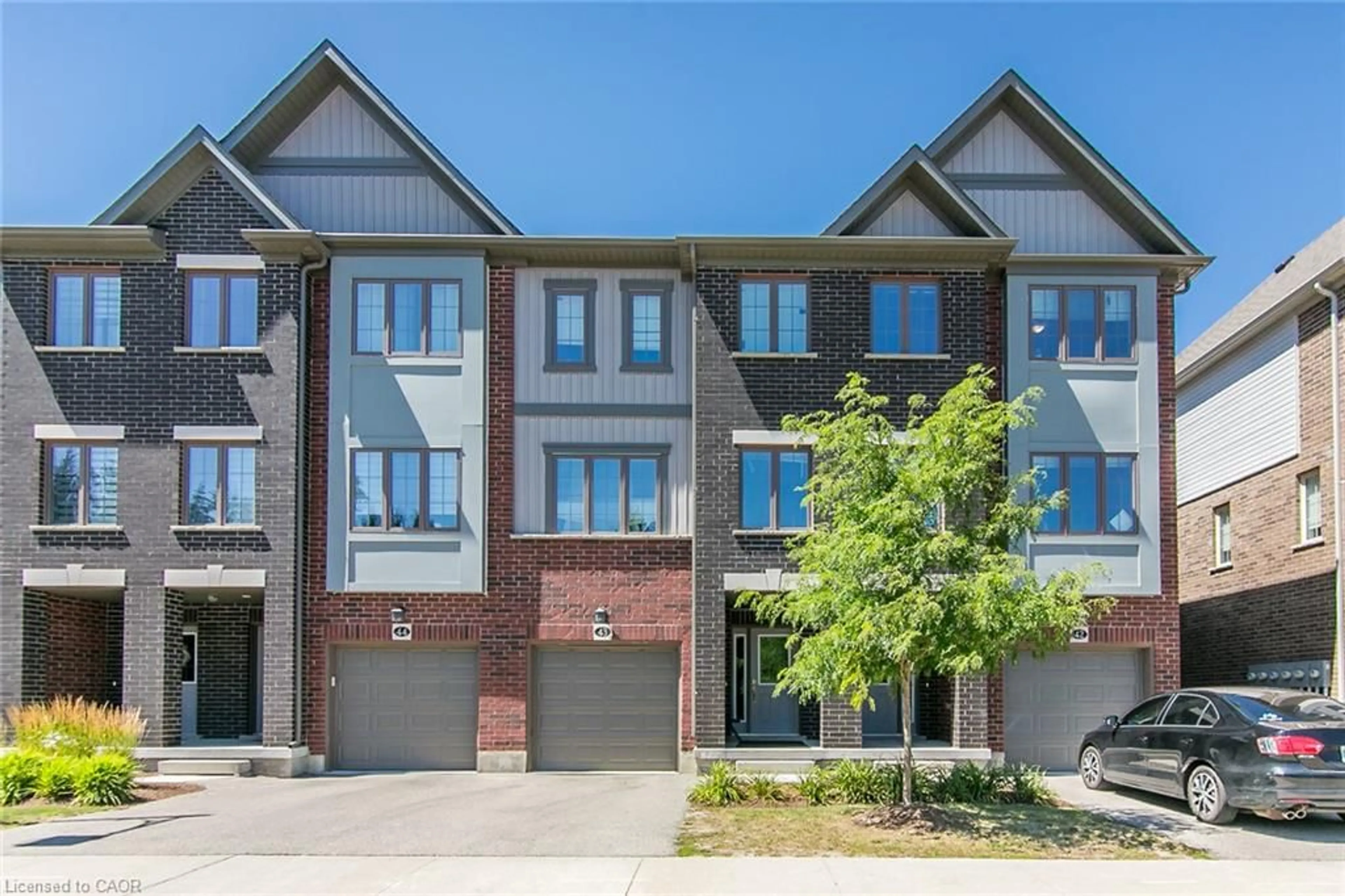 Home with brick exterior material, street for 311 Woolwich St #43, Waterloo Ontario N2K 0H4