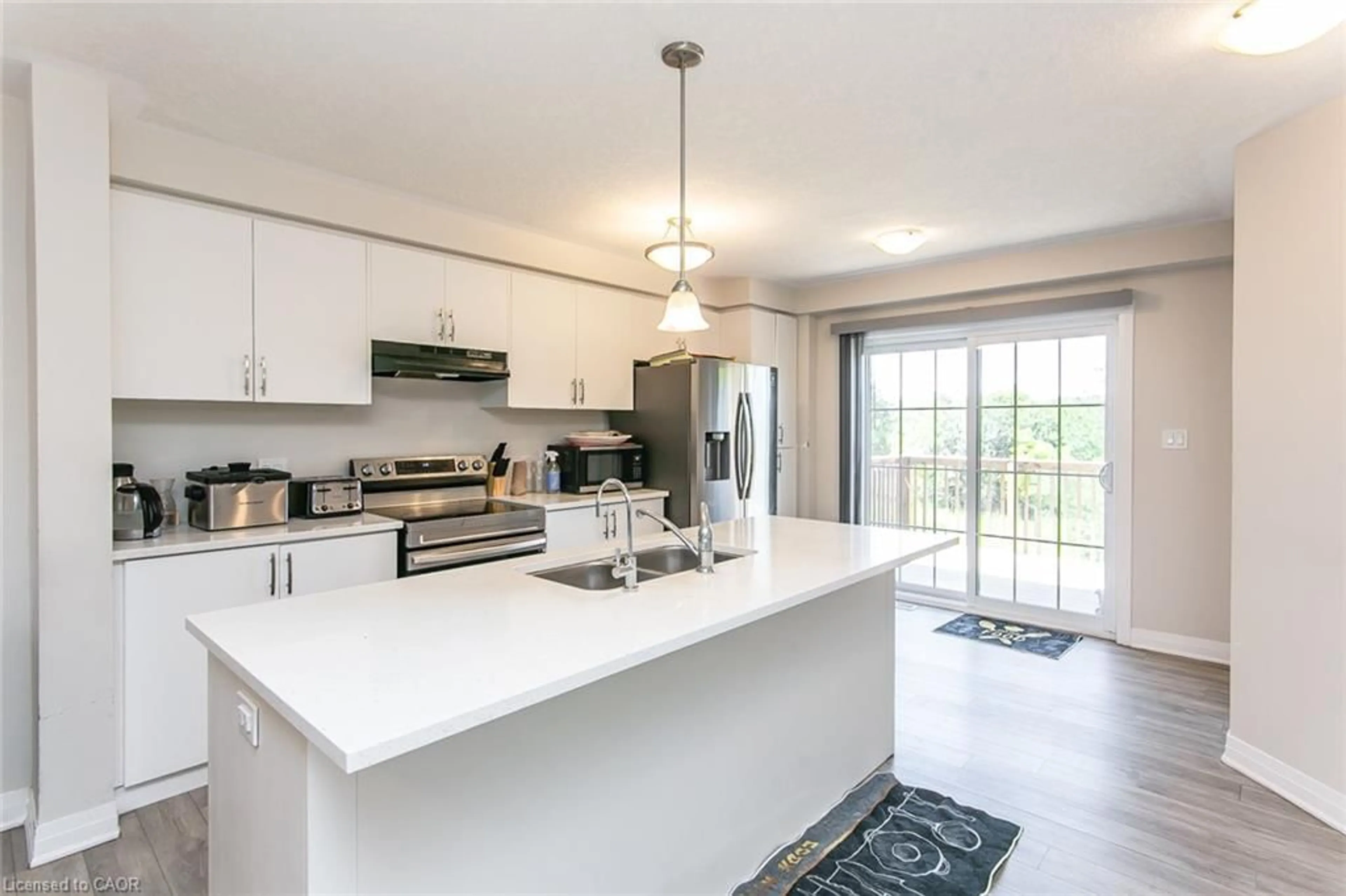 Open concept kitchen, ceramic/tile floor for 311 Woolwich St #43, Waterloo Ontario N2K 0H4