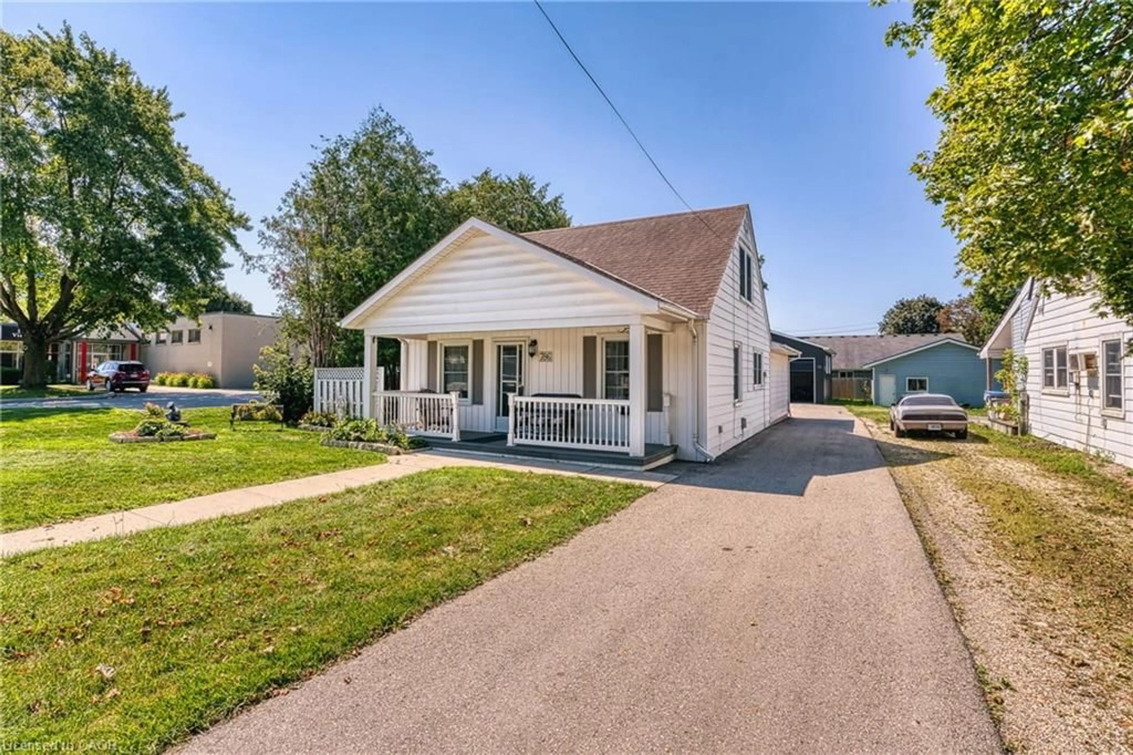 Home with vinyl exterior material, street for 786 Main St, Listowel Ontario N4W 1B3