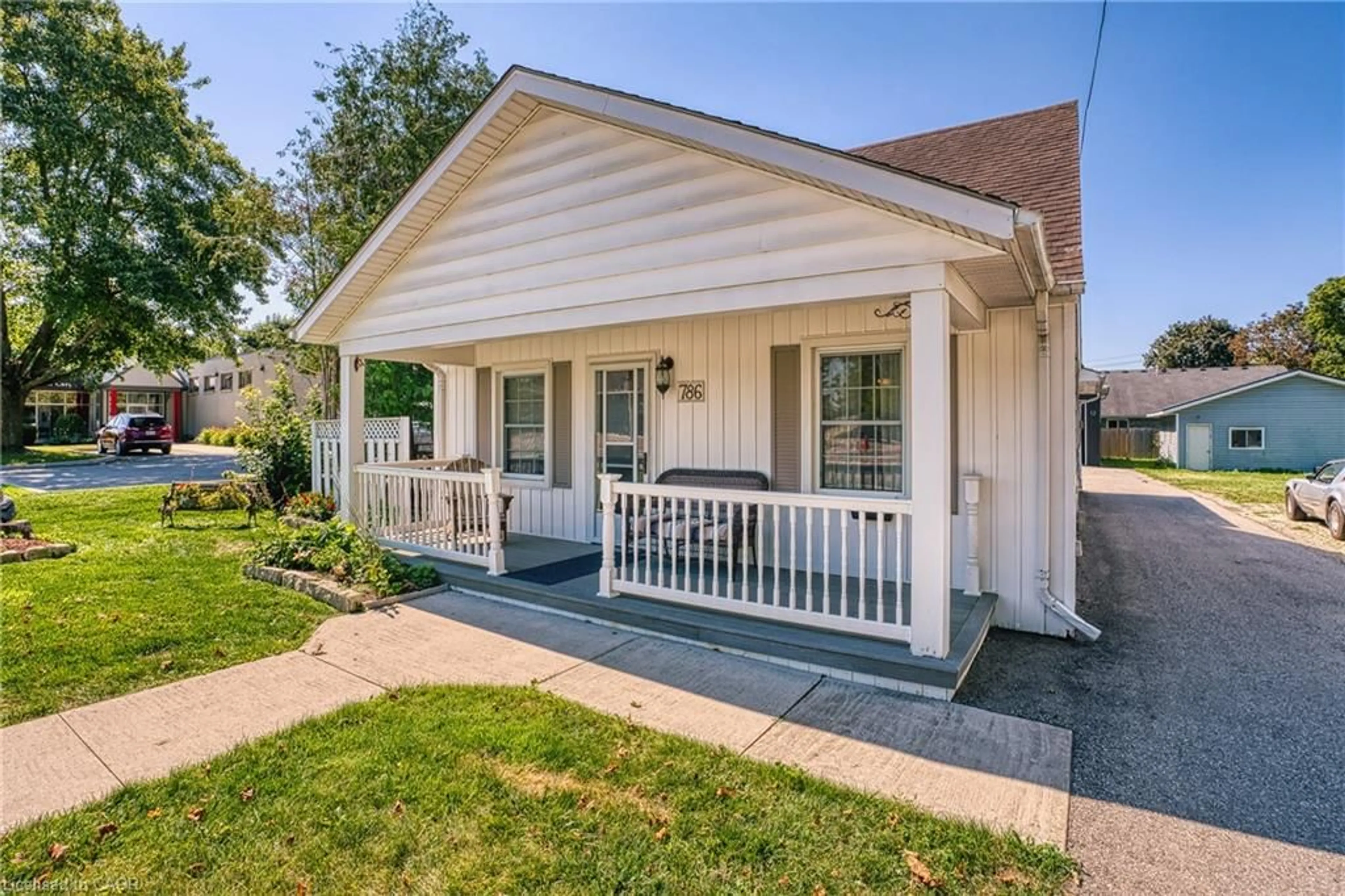 Home with vinyl exterior material, street for 786 Main St, Listowel Ontario N4W 1B3
