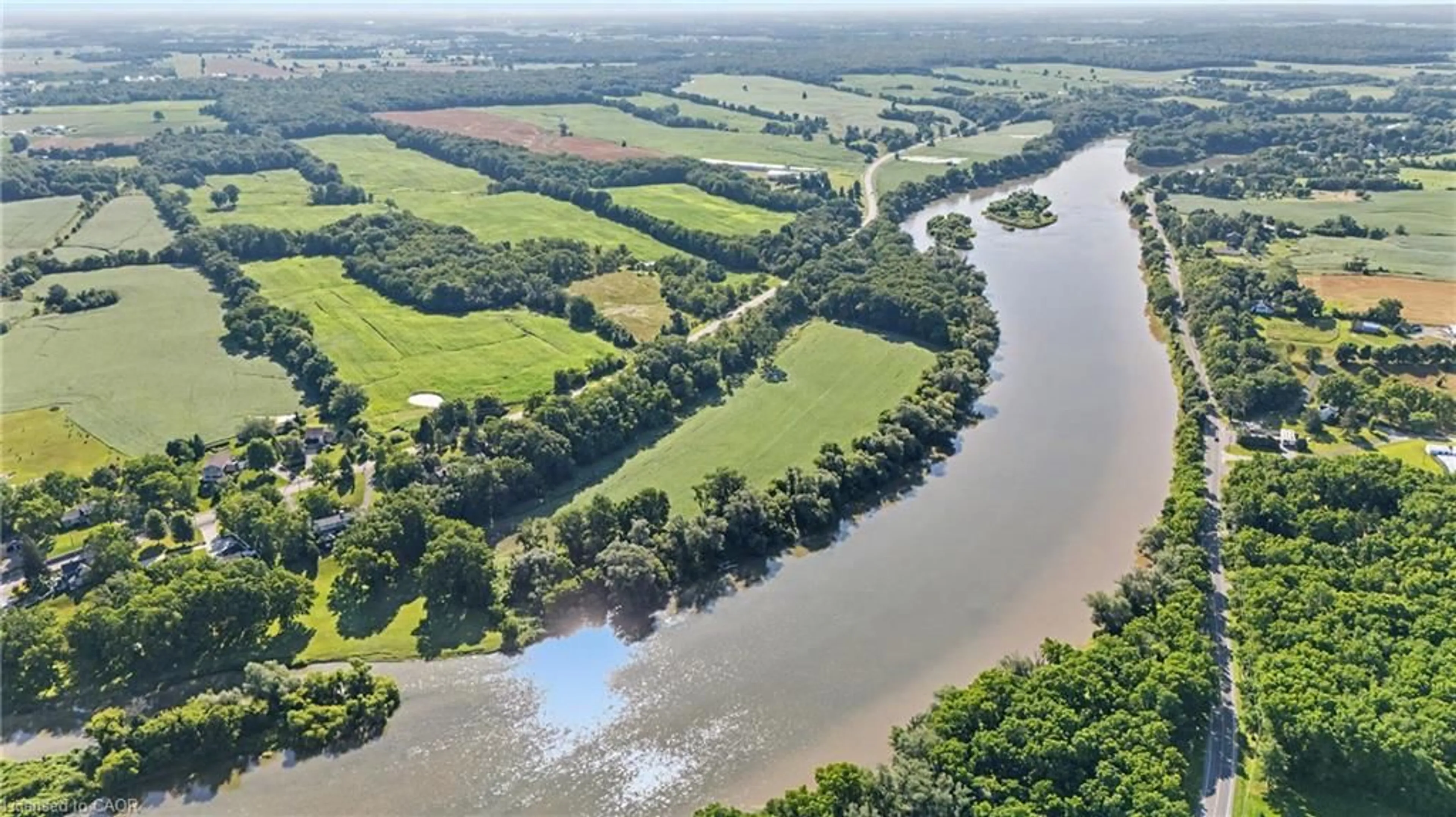 A pic from outside/outdoor area/front of a property/back of a property/a pic from drone, water/lake/river/ocean view for 975 Haldimand Hwy 54, York Ontario N0A 1E0