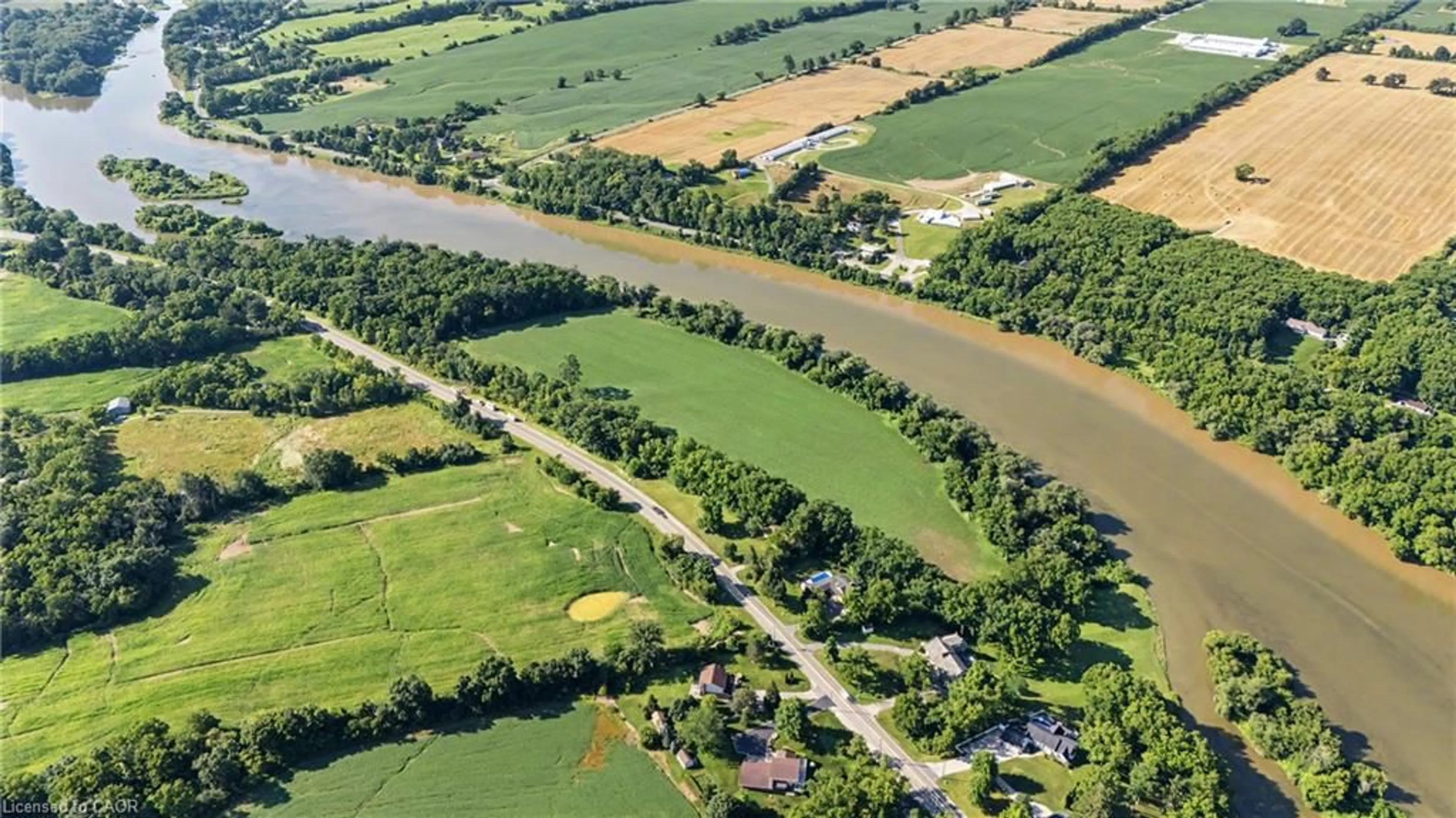 A pic from outside/outdoor area/front of a property/back of a property/a pic from drone, water/lake/river/ocean view for 975 Haldimand Hwy 54, York Ontario N0A 1E0