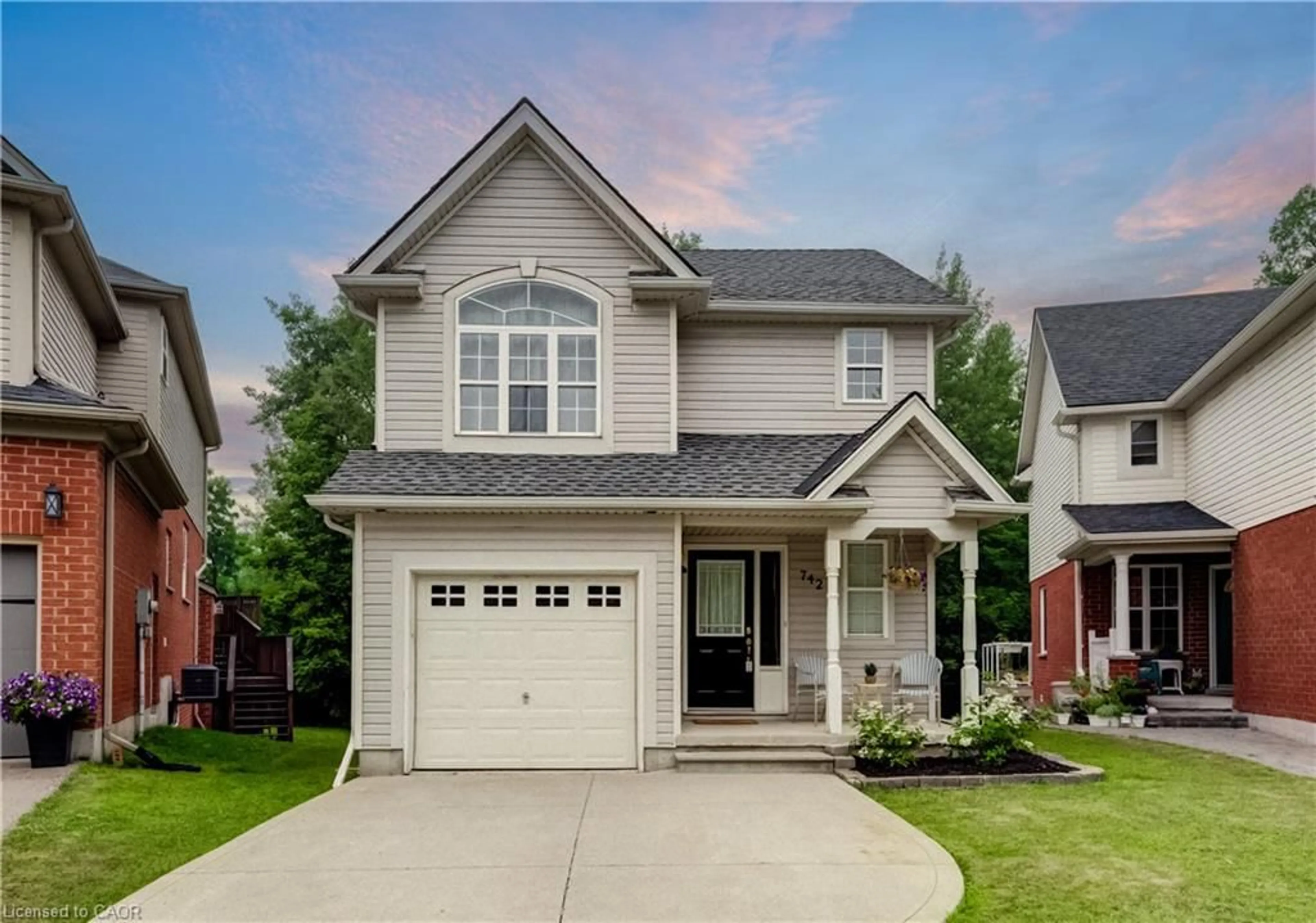 Home with vinyl exterior material, street for 742 Brookmill Pl, Waterloo Ontario N2V 2P1
