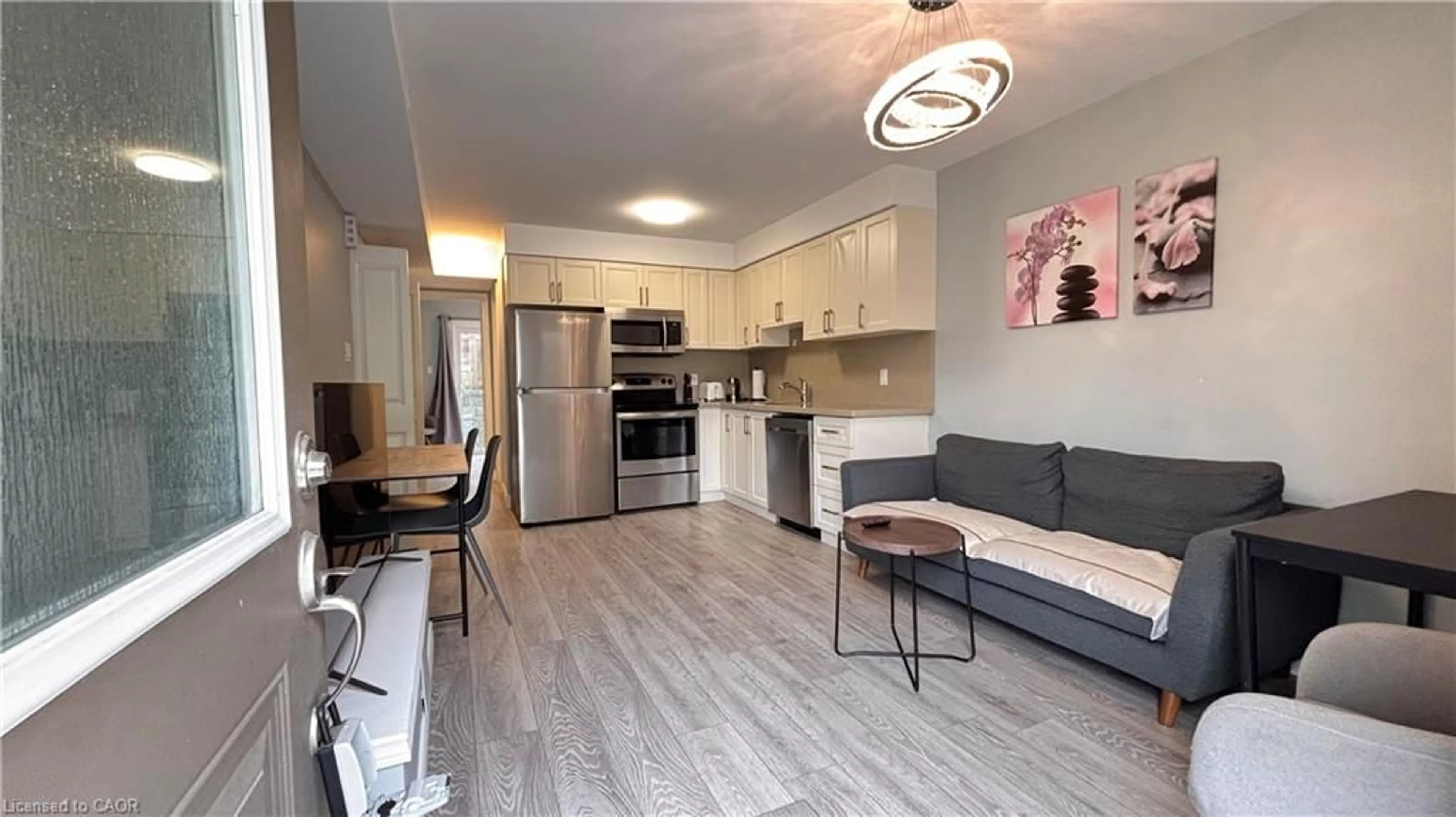 Open concept kitchen, wood/laminate floor for 122 Courtland Ave #14, Kitchener Ontario N2G 0B8