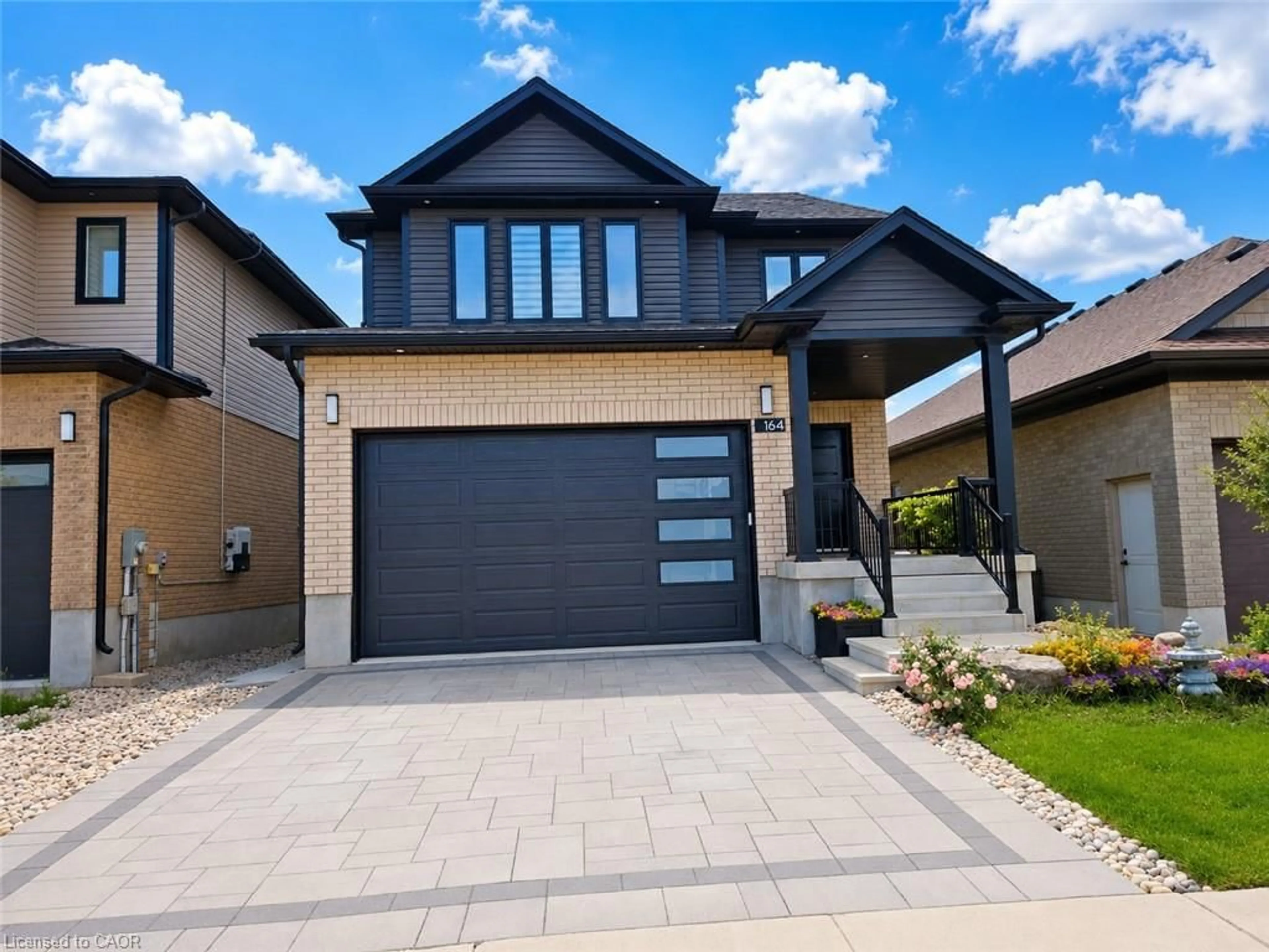 Home with brick exterior material, street for 164 Timber Trail Rd, Elmira Ontario N3B 0E3