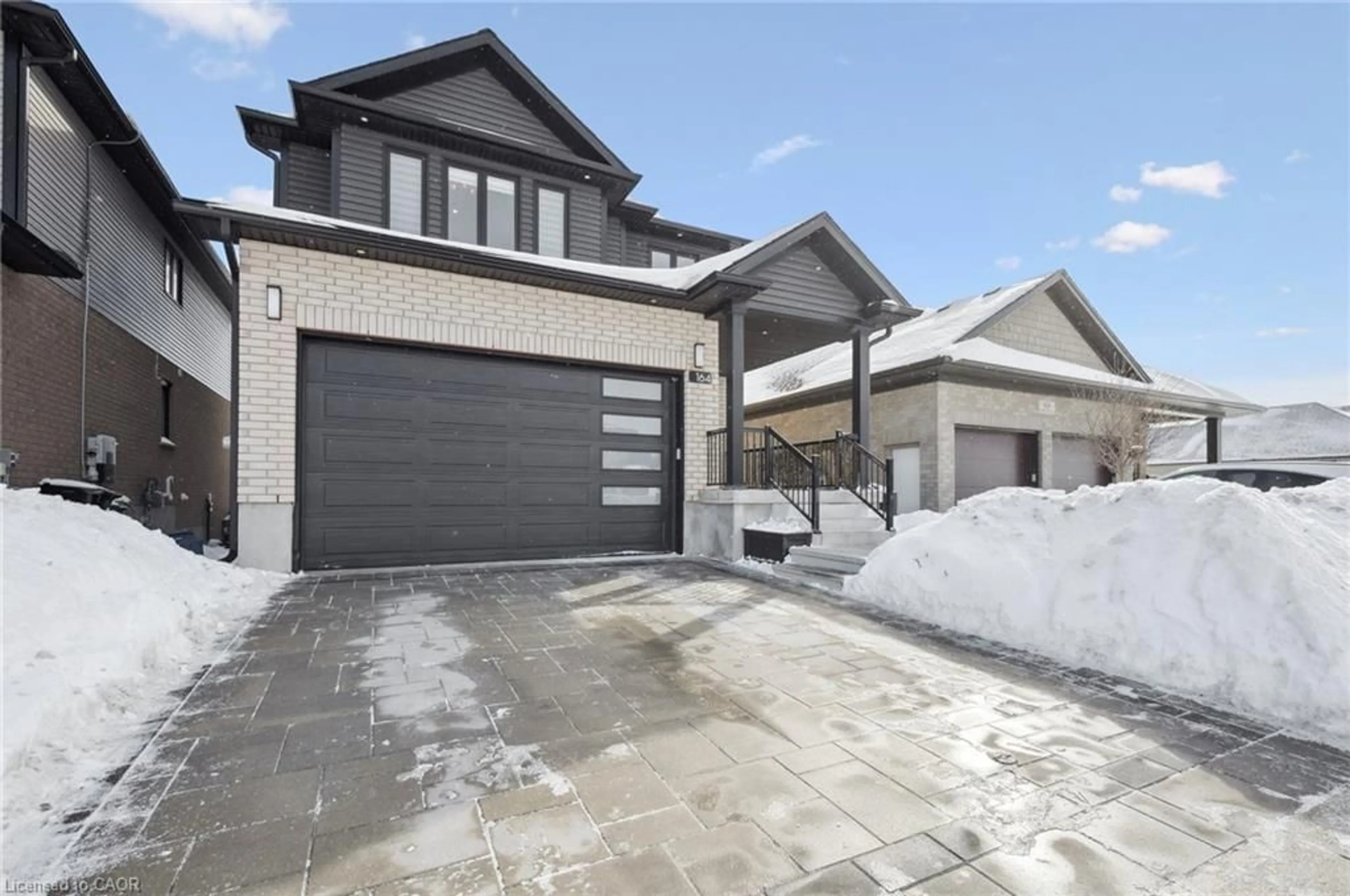 Home with brick exterior material, street for 164 Timber Trail Rd, Elmira Ontario N3B 0E3