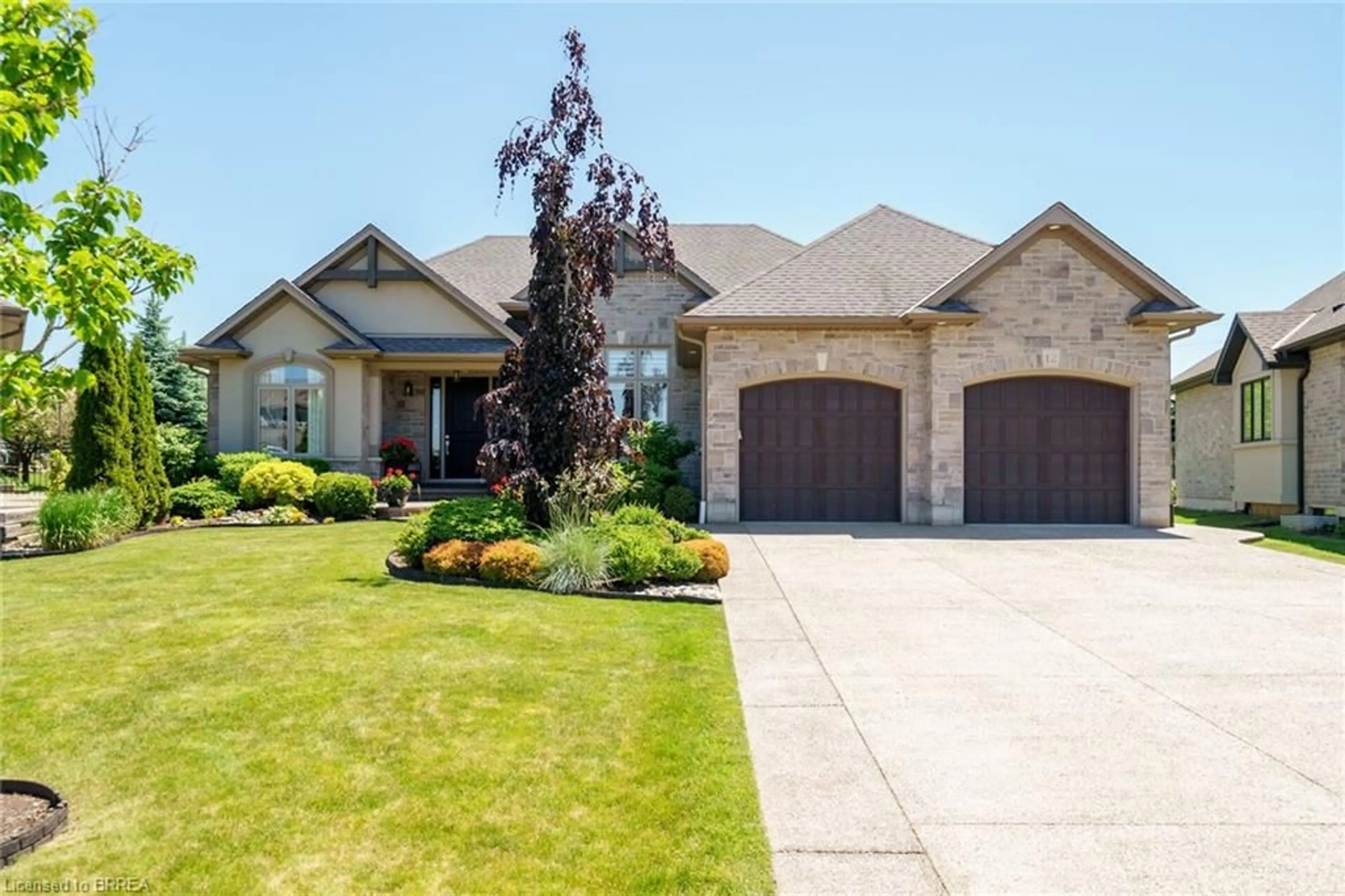 Home with brick exterior material, street for 12 Ellington Pl, Brantford Ontario N3T 5L7