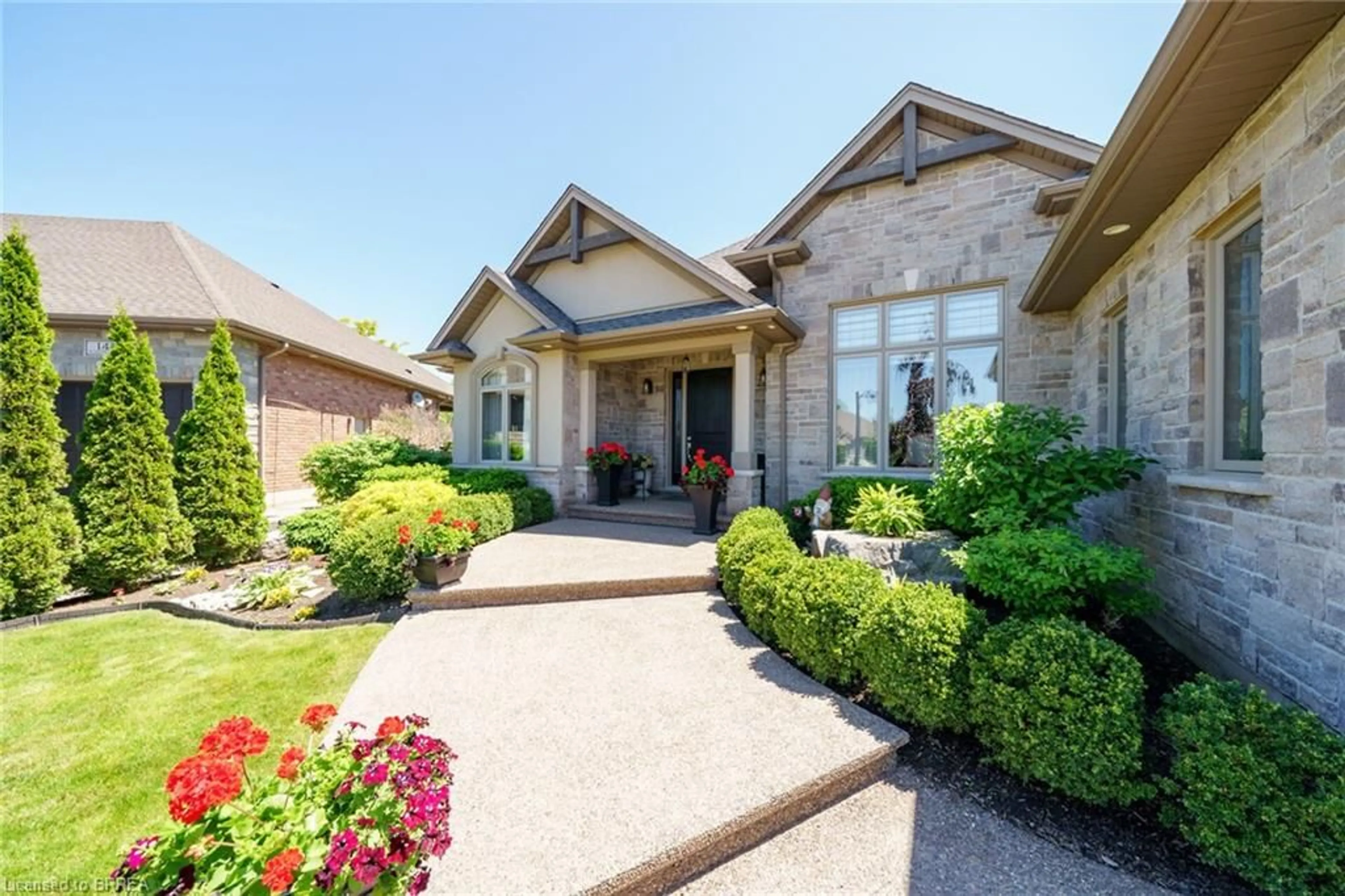 Home with brick exterior material, street for 12 Ellington Pl, Brantford Ontario N3T 5L7