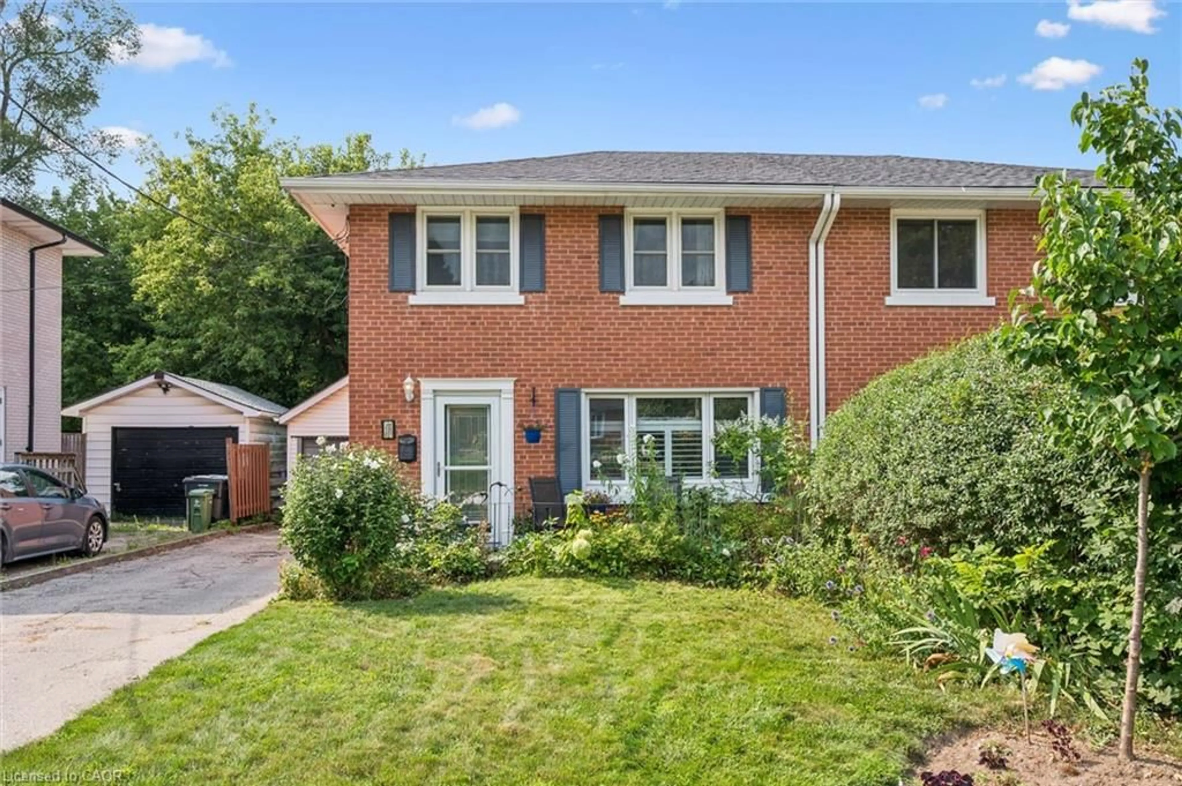 Home with brick exterior material, street for 18 June Ave, Guelph Ontario N1H 1H6
