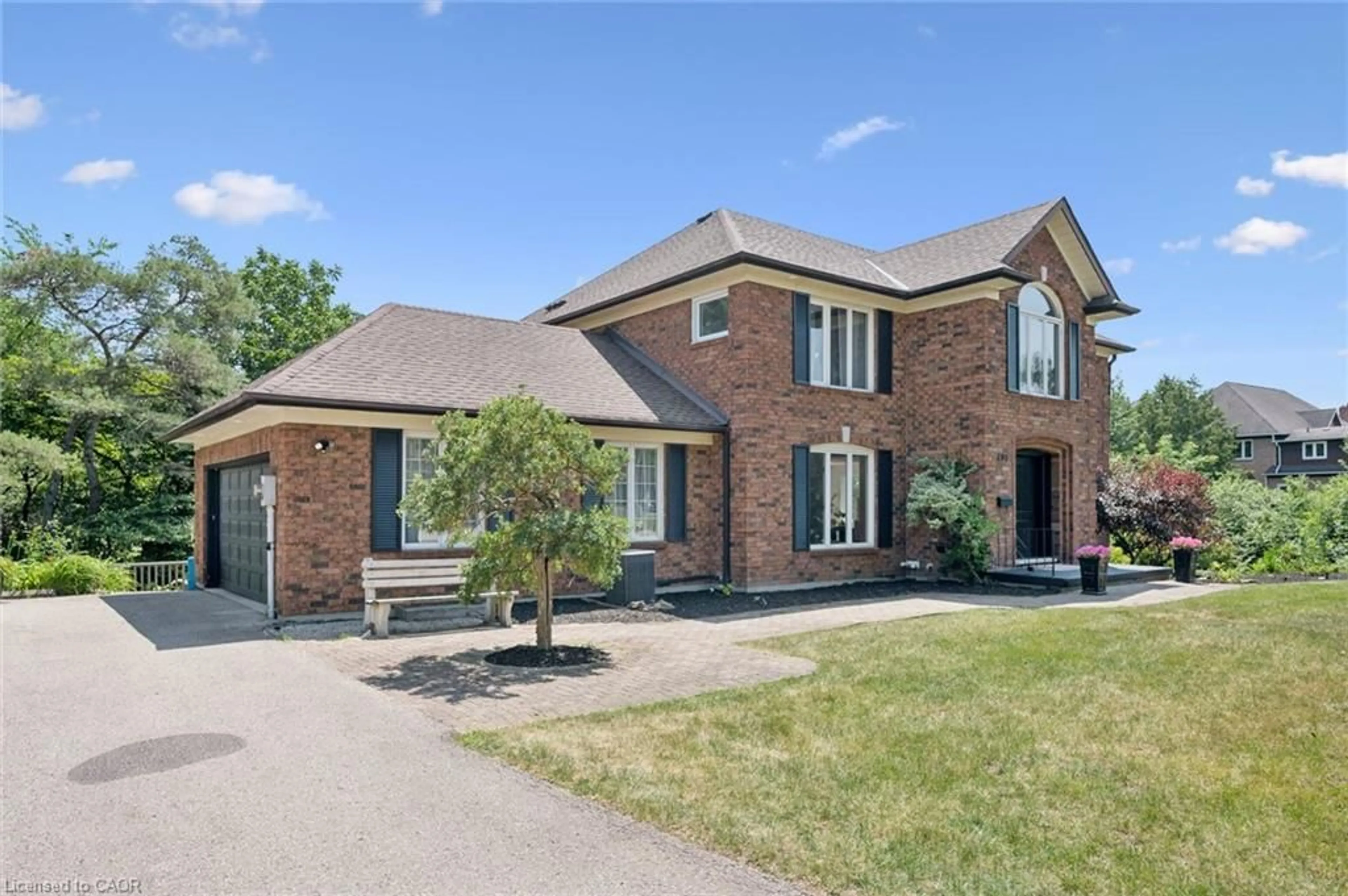 Home with brick exterior material, street for 105 Cobblestone Pl, Rockwood Ontario N0B 2K0