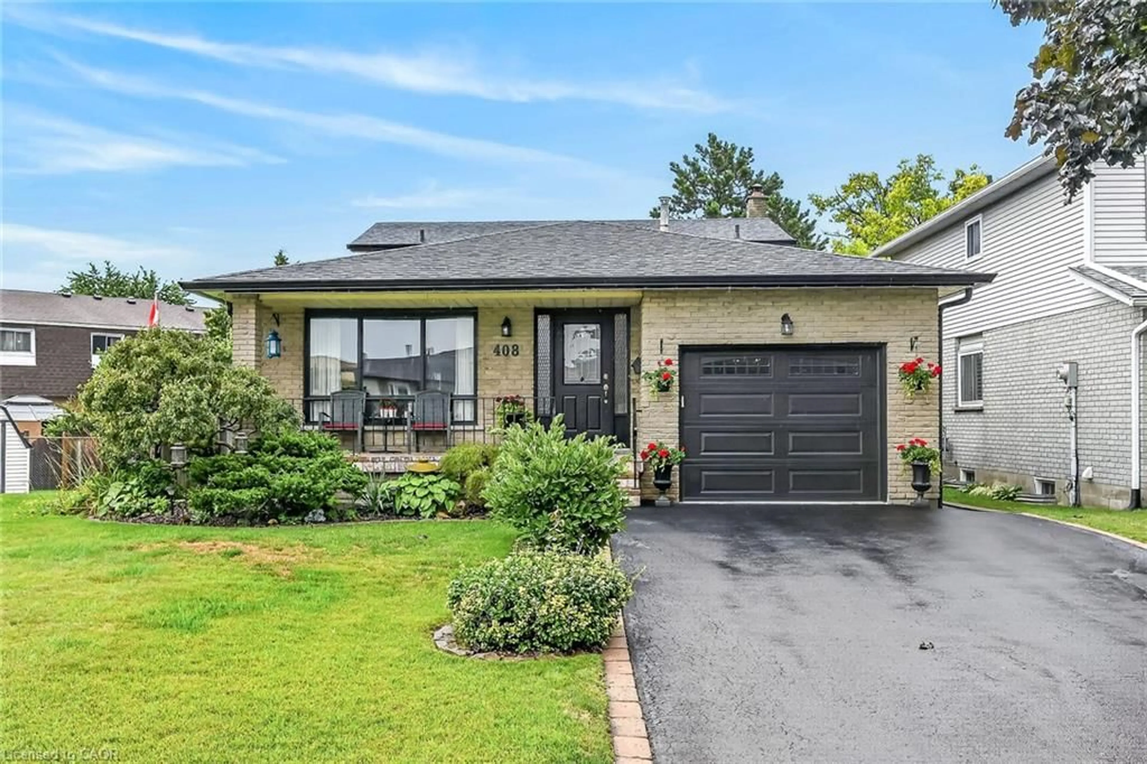 Home with brick exterior material, street for 408 Rexford Dr, Hamilton Ontario L8W 2M6