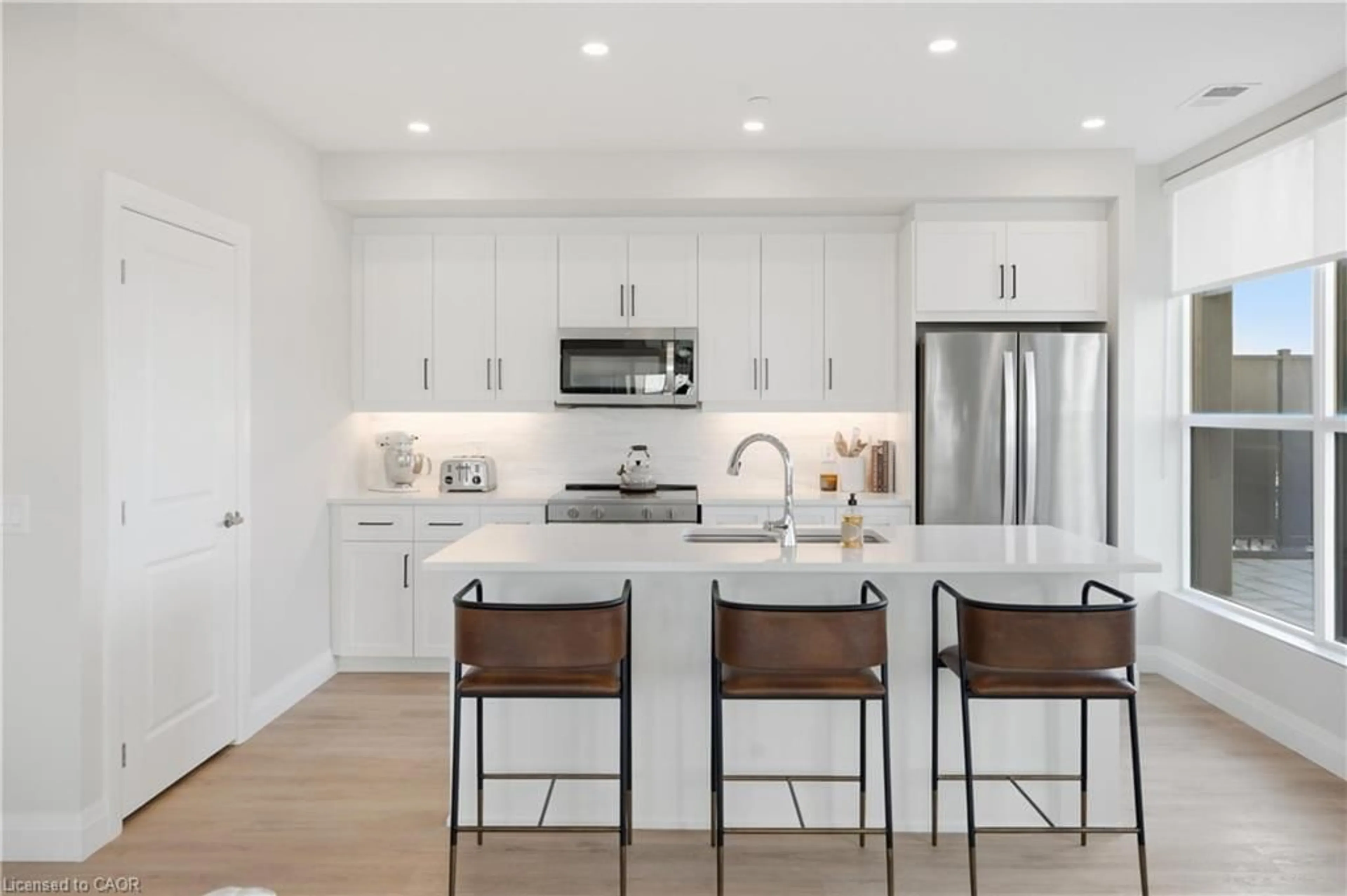 Open concept kitchen, ceramic/tile floor for 1882 Gordon St #320, Guelph Ontario N1L 0P6
