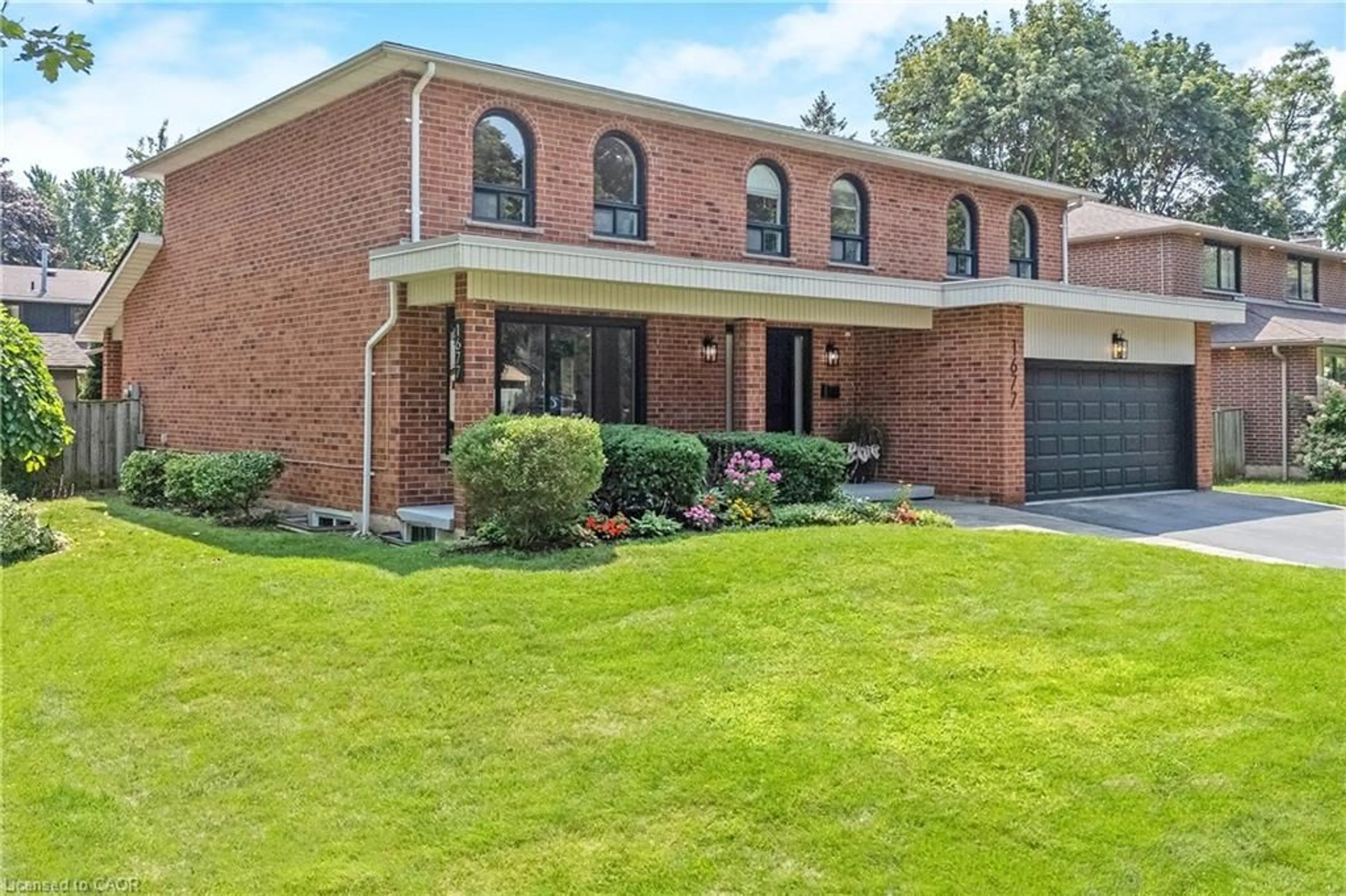 Home with brick exterior material, street for 1677 Sherwood Forrest Cir, Mississauga Ontario L5K 2G8