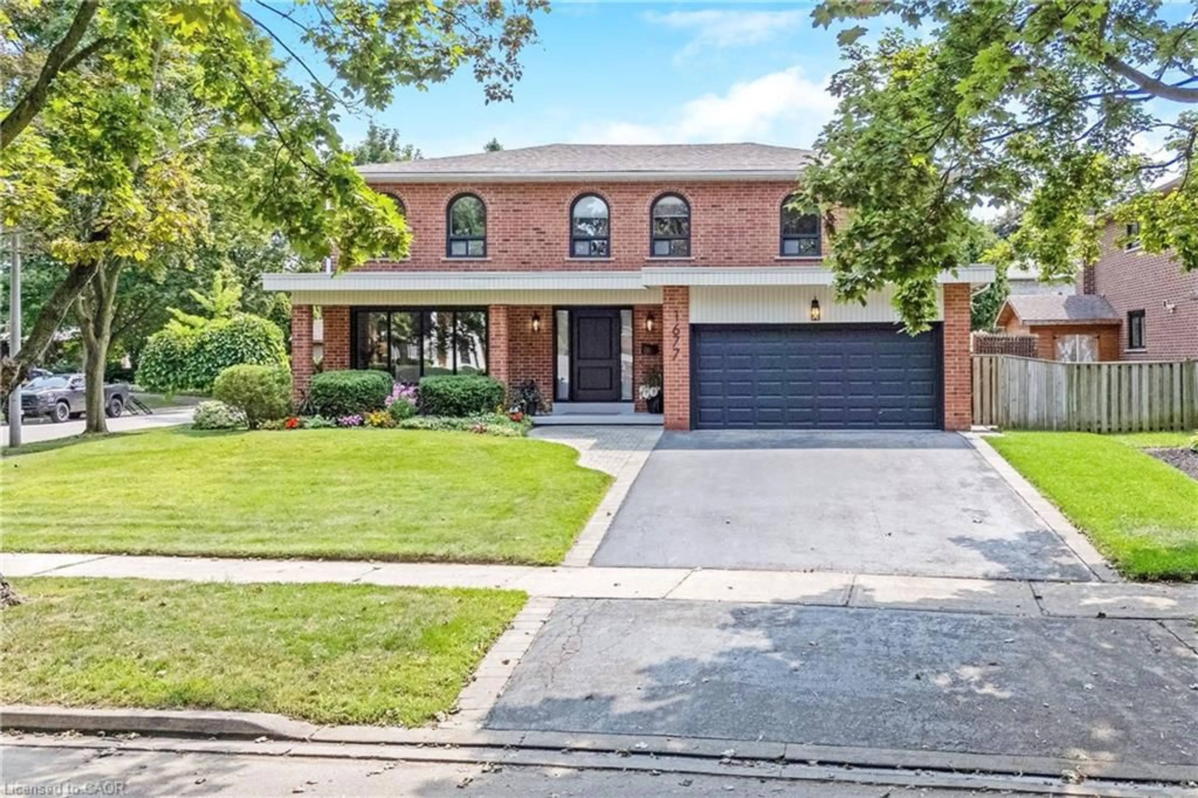 Home with brick exterior material, street for 1677 Sherwood Forrest Cir, Mississauga Ontario L5K 2G8