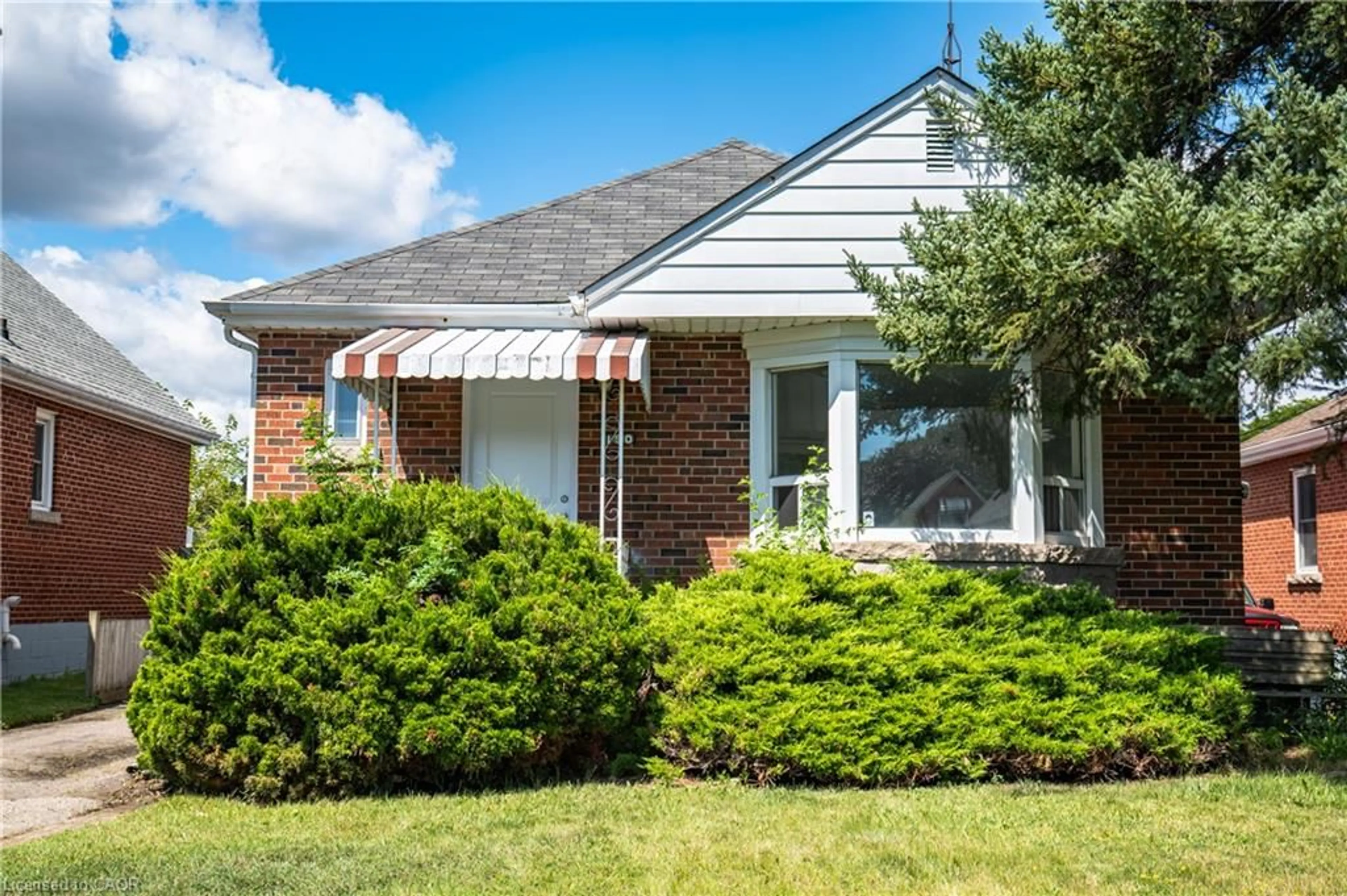 Home with brick exterior material, street for 150 Beland Ave, Hamilton Ontario L8K 3T6
