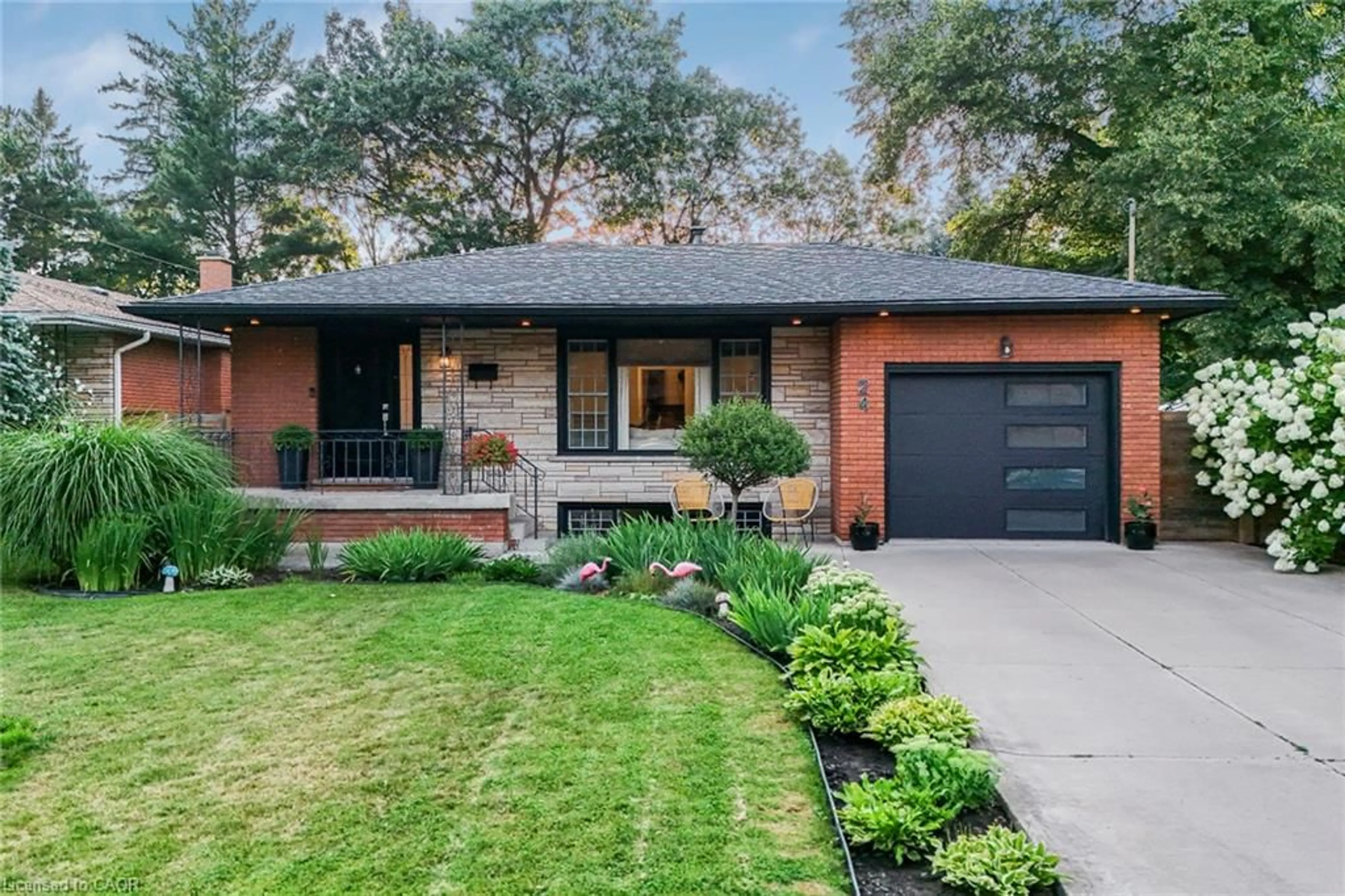 Home with brick exterior material, street for 24 Garvey Cres, Hamilton Ontario L8K 3X1