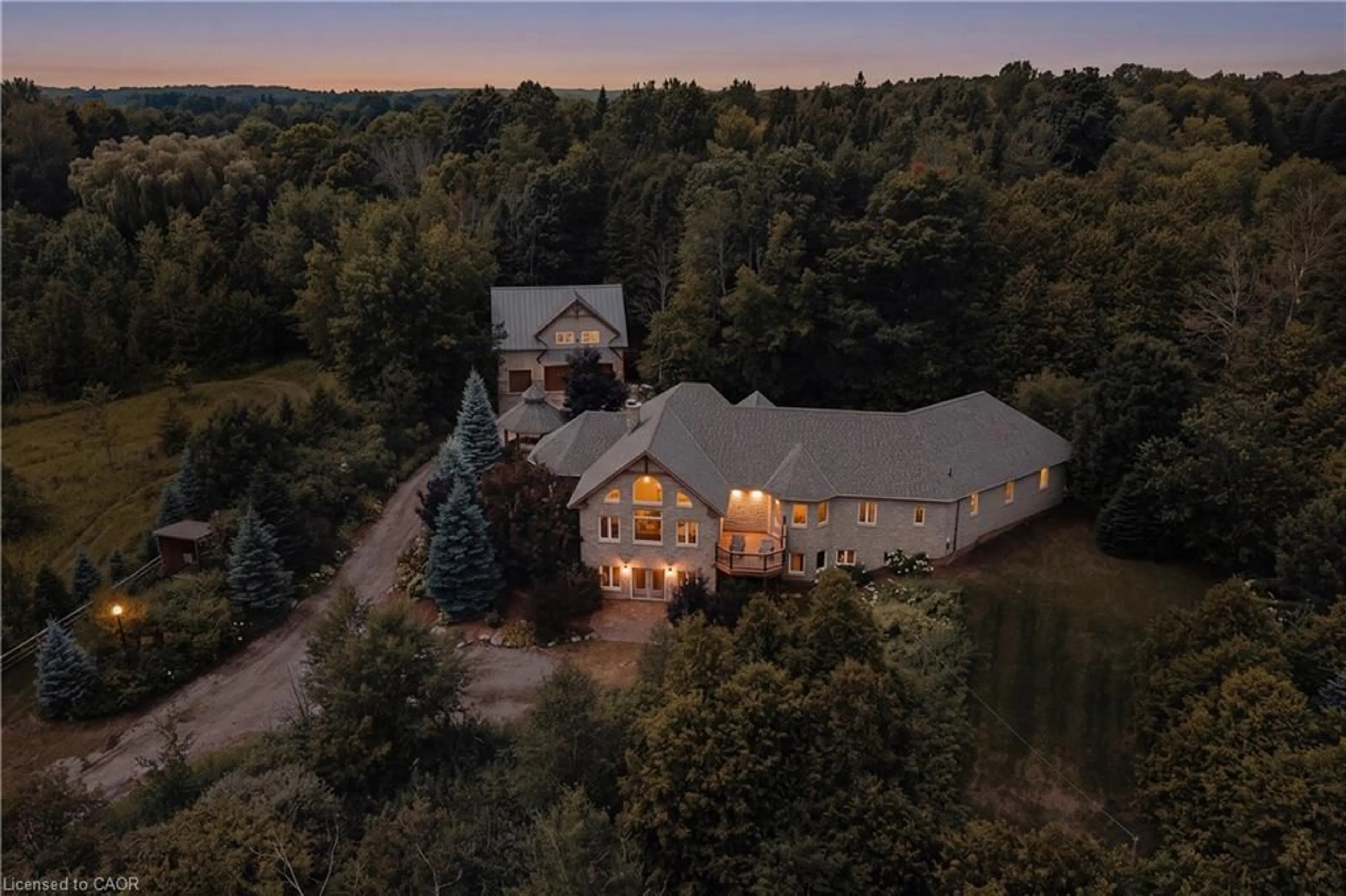 A pic from outside/outdoor area/front of a property/back of a property/a pic from drone, water/lake/river/ocean view for 7392 Wellington Road 11, Moorefield Ontario N0G 2K0