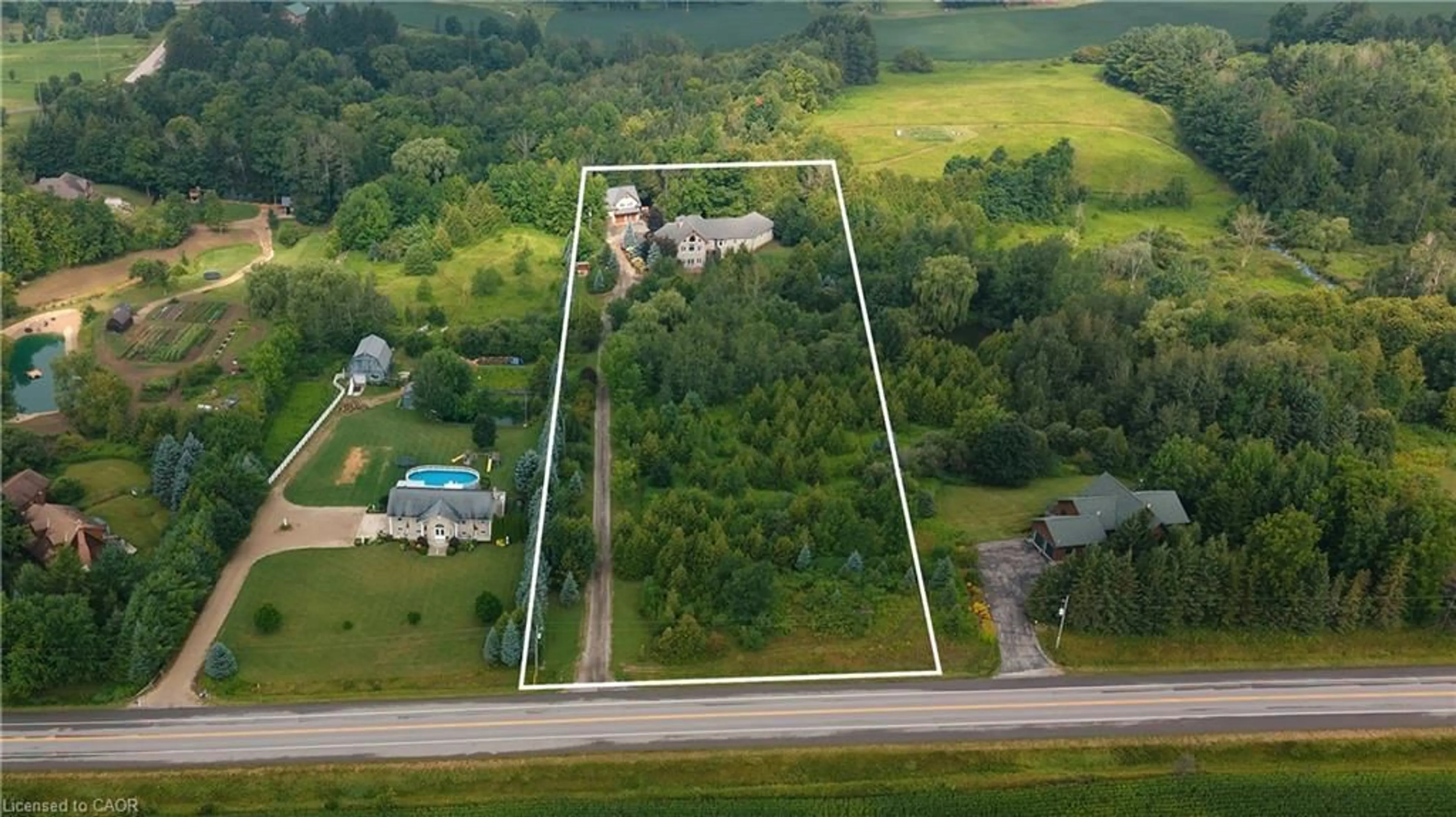 A pic from outside/outdoor area/front of a property/back of a property/a pic from drone, building for 7392 Wellington Road 11, Moorefield Ontario N0G 2K0