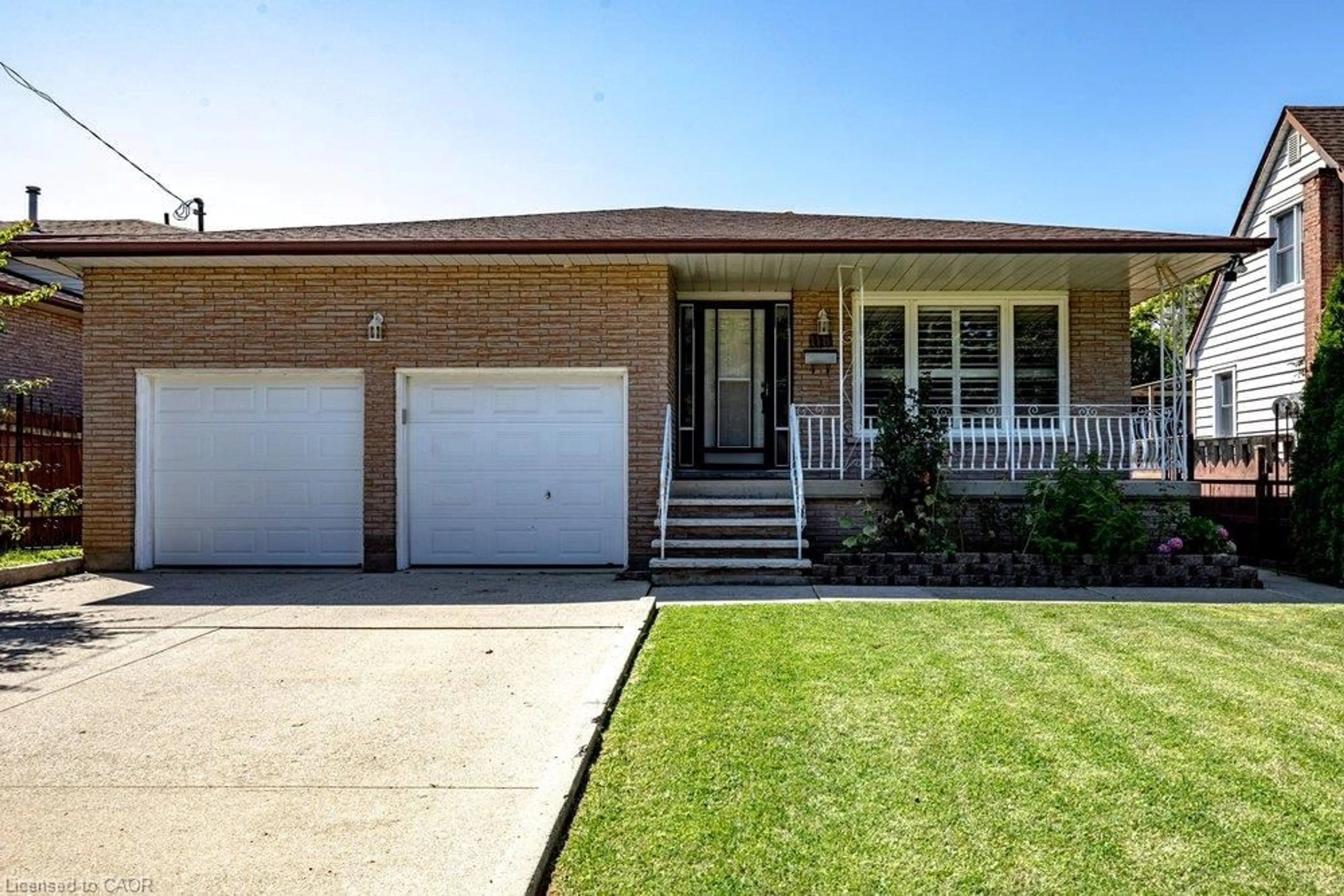 Home with brick exterior material, street for 118 Pottruff Rd, Hamilton Ontario L8K 4A2