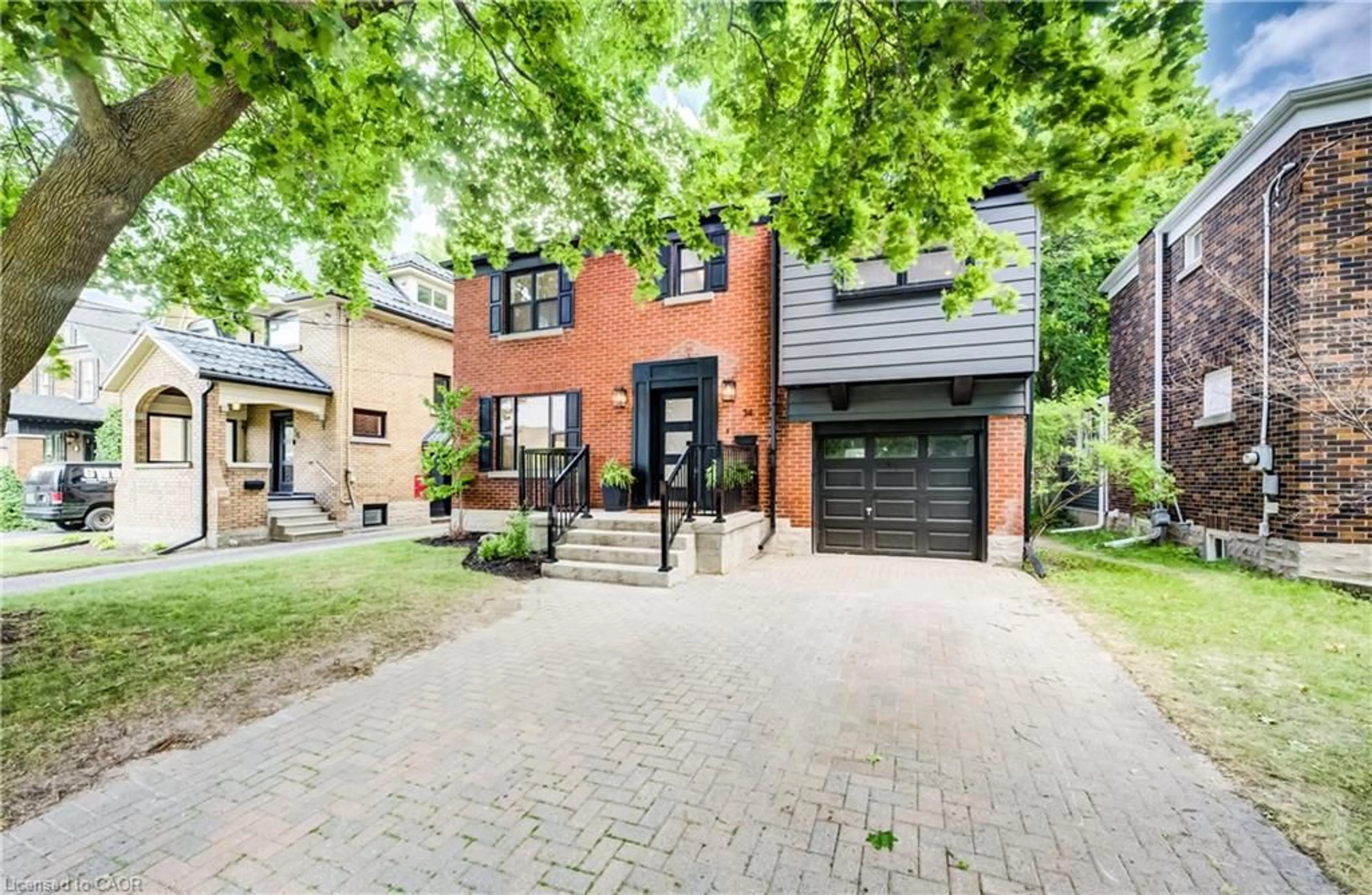 Home with brick exterior material, street for 34 Moore Ave, Waterloo Ontario N2J 3E5