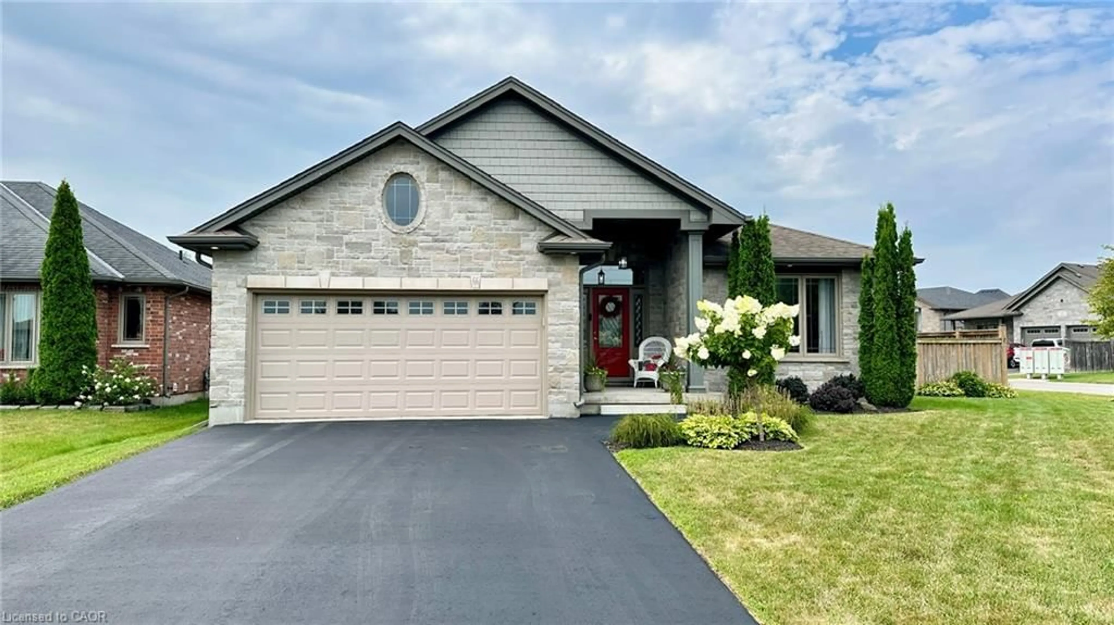Home with brick exterior material, street for 66 Driftwood Dr, Simcoe Ontario N3Y 0B4