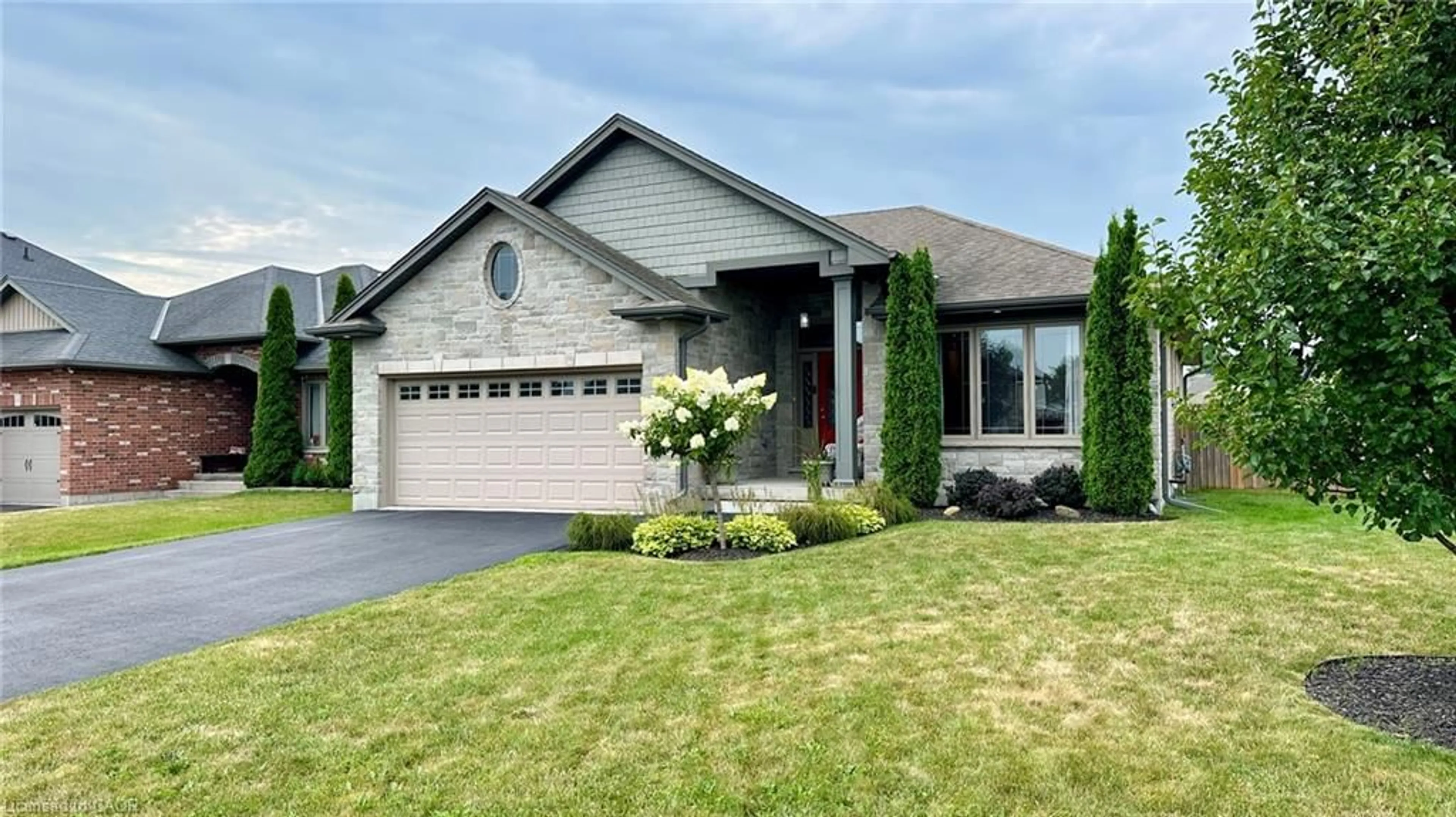 Home with brick exterior material, street for 66 Driftwood Dr, Simcoe Ontario N3Y 0B4