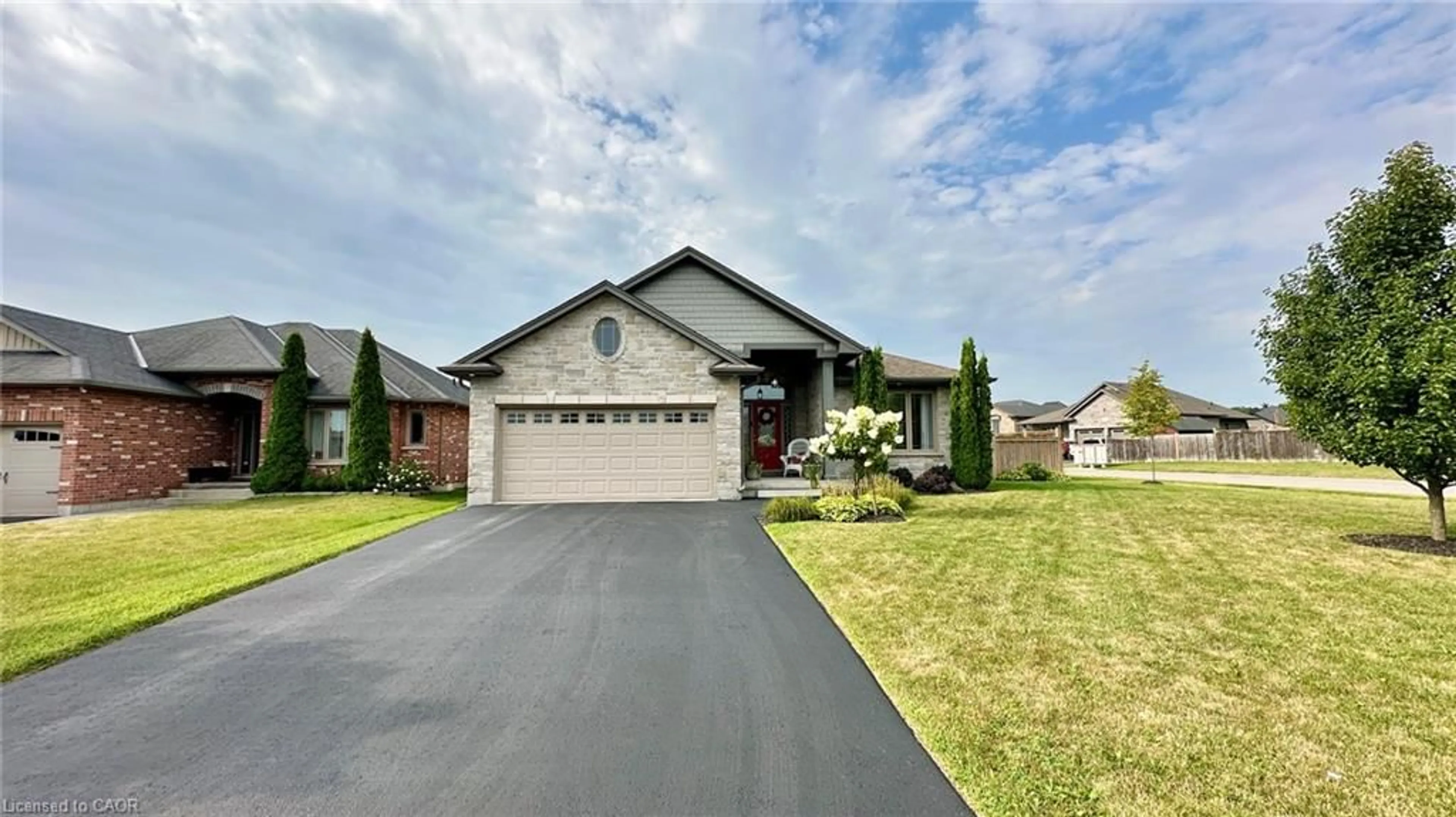 Home with brick exterior material, street for 66 Driftwood Dr, Simcoe Ontario N3Y 0B4