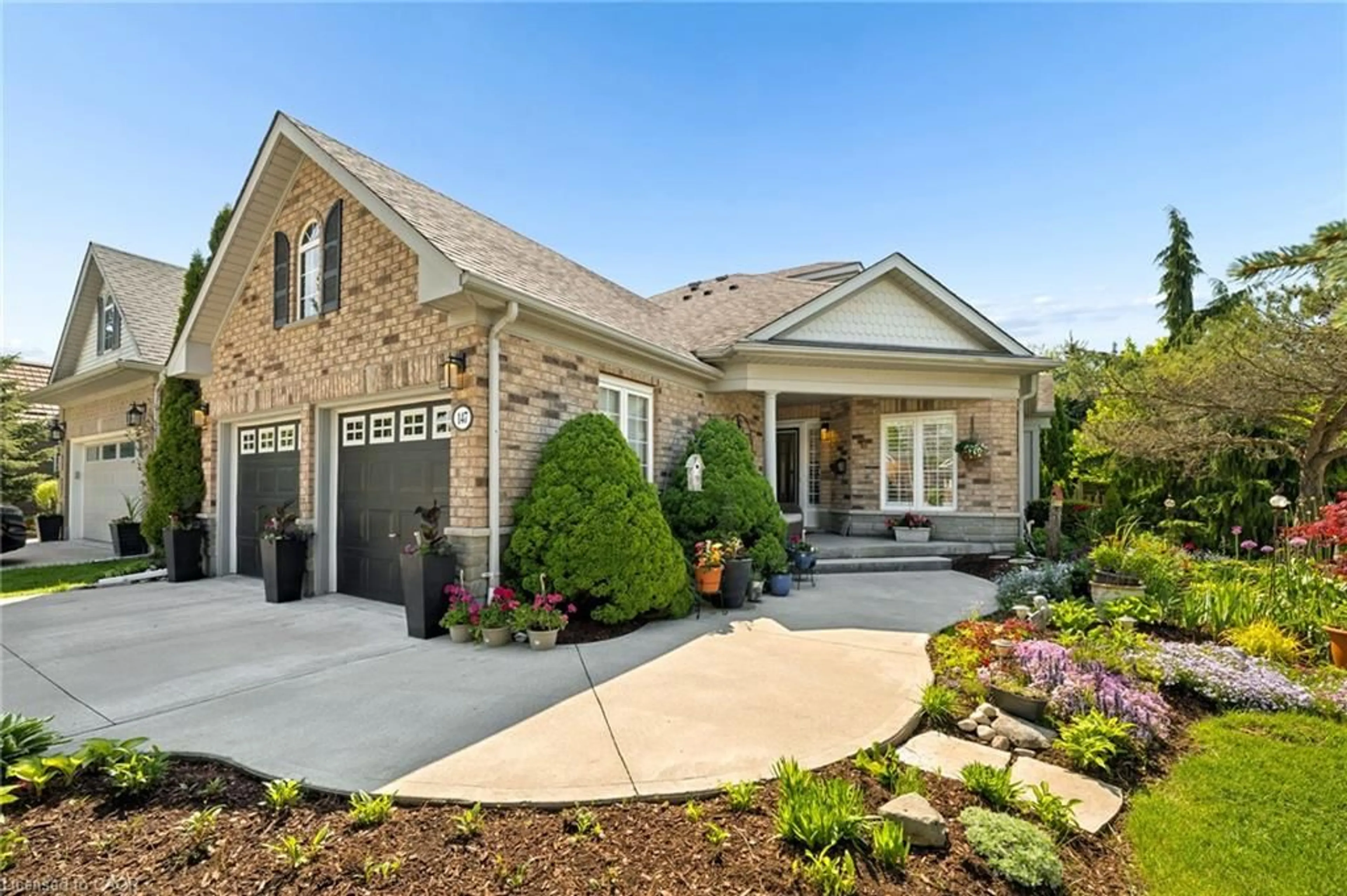 Home with brick exterior material, street for 147 Reiber Crt, Waterloo Ontario N2L 6N2