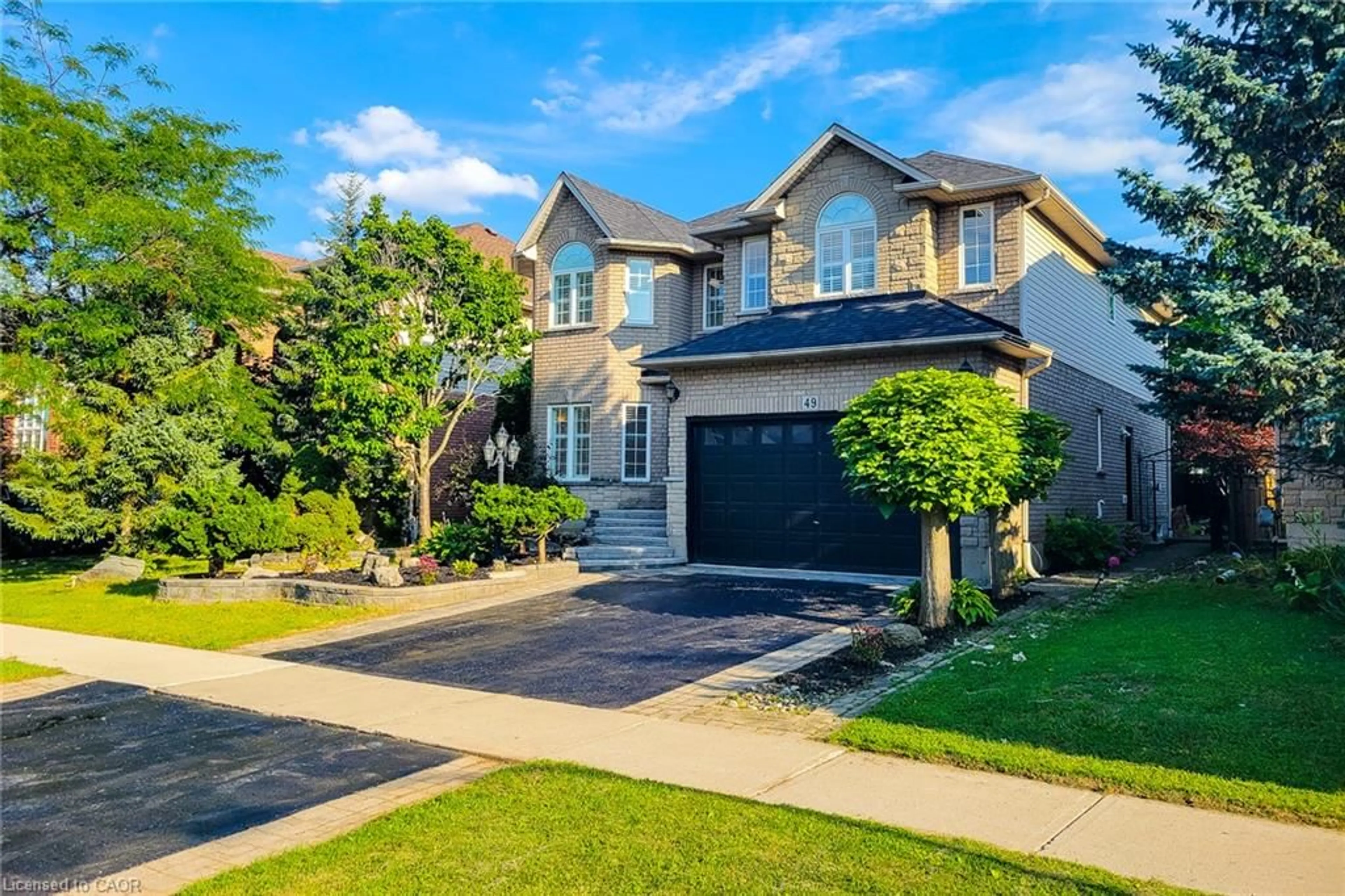 Home with brick exterior material, street for 49 Stonehenge Dr, Ancaster Ontario L9K 1N6