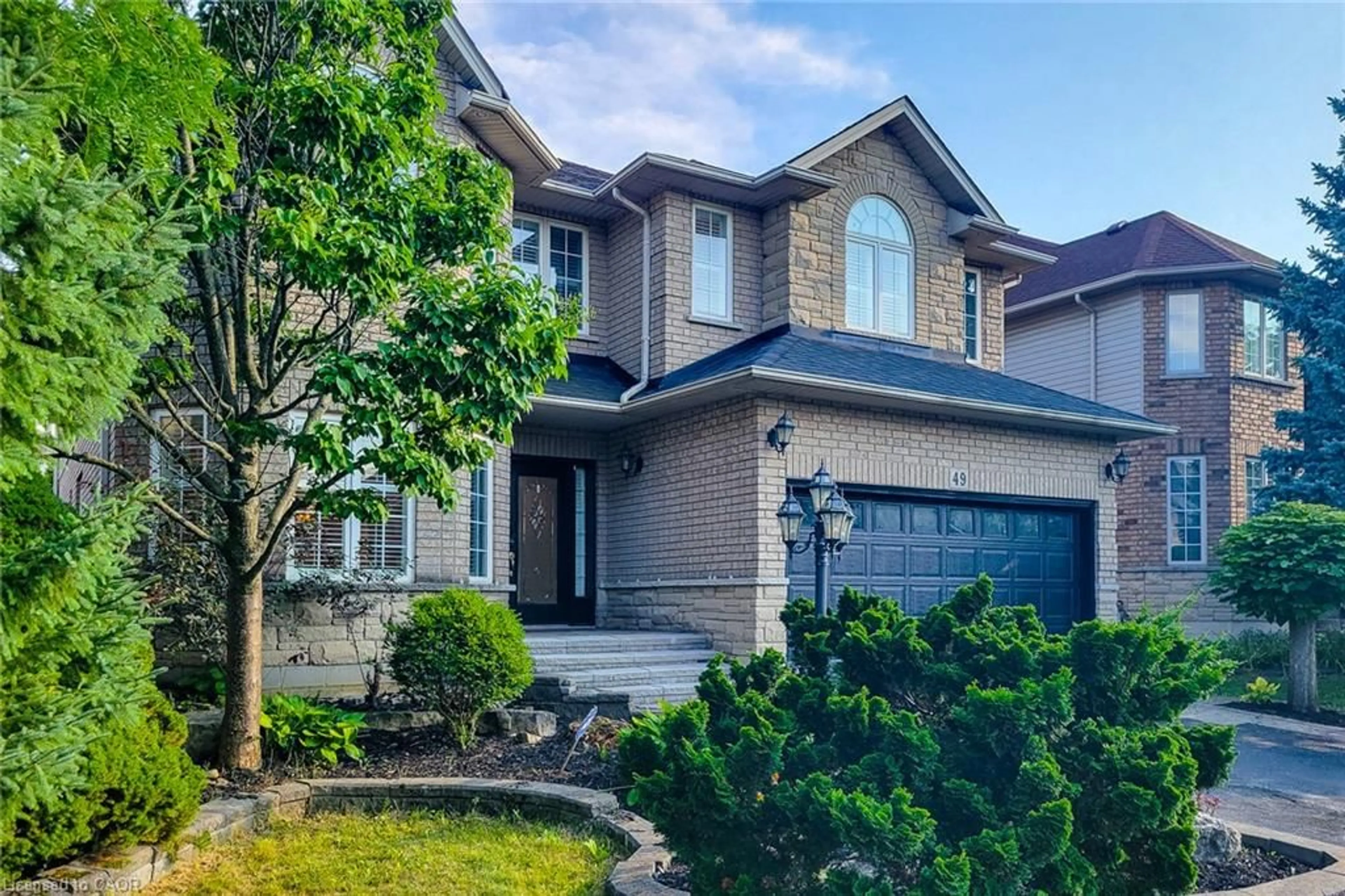 Home with brick exterior material, street for 49 Stonehenge Dr, Ancaster Ontario L9K 1N6