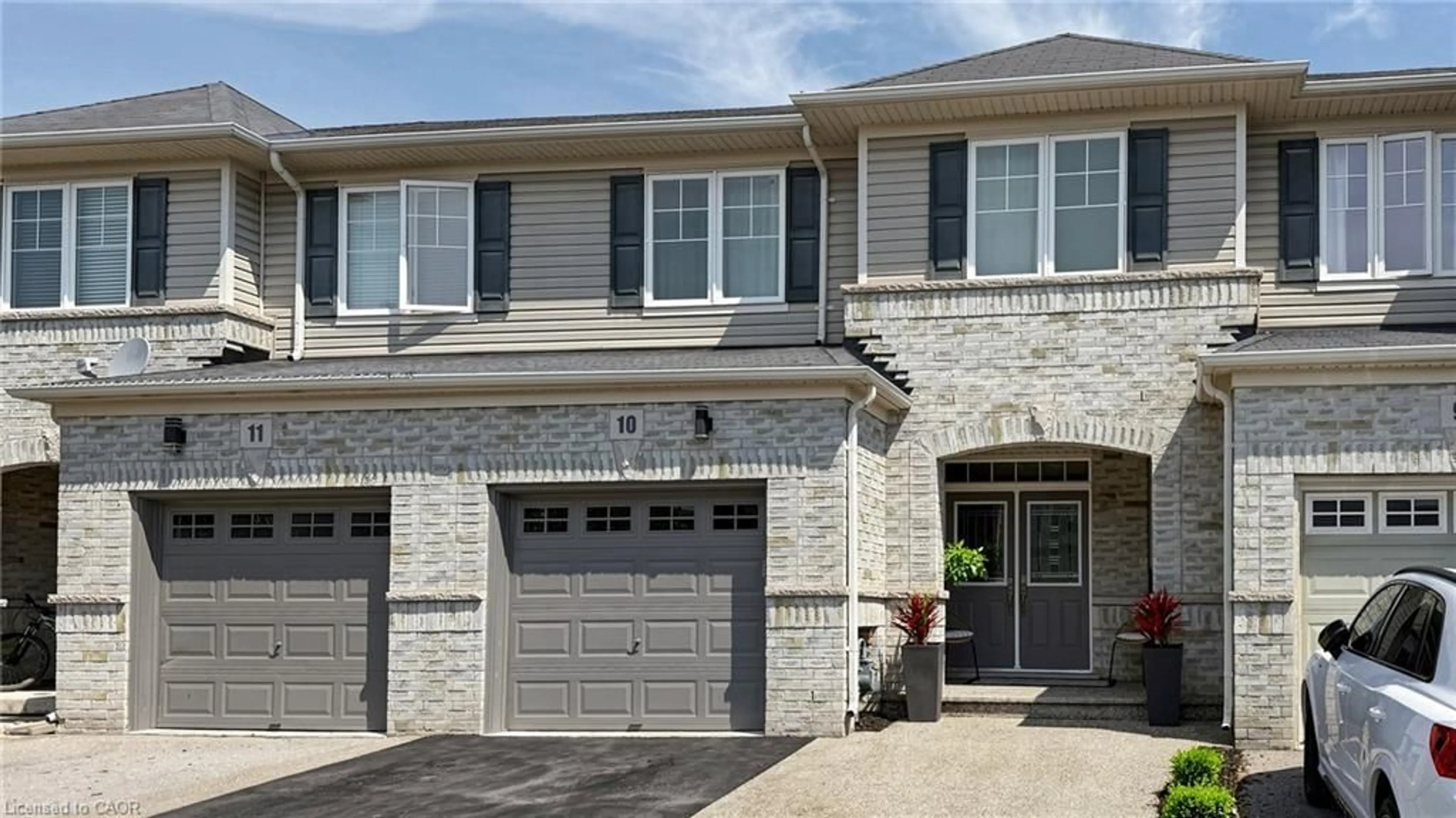 Home with brick exterior material, street for 3275 Stalybridge Dr #10, Oakville Ontario L6M 0L2