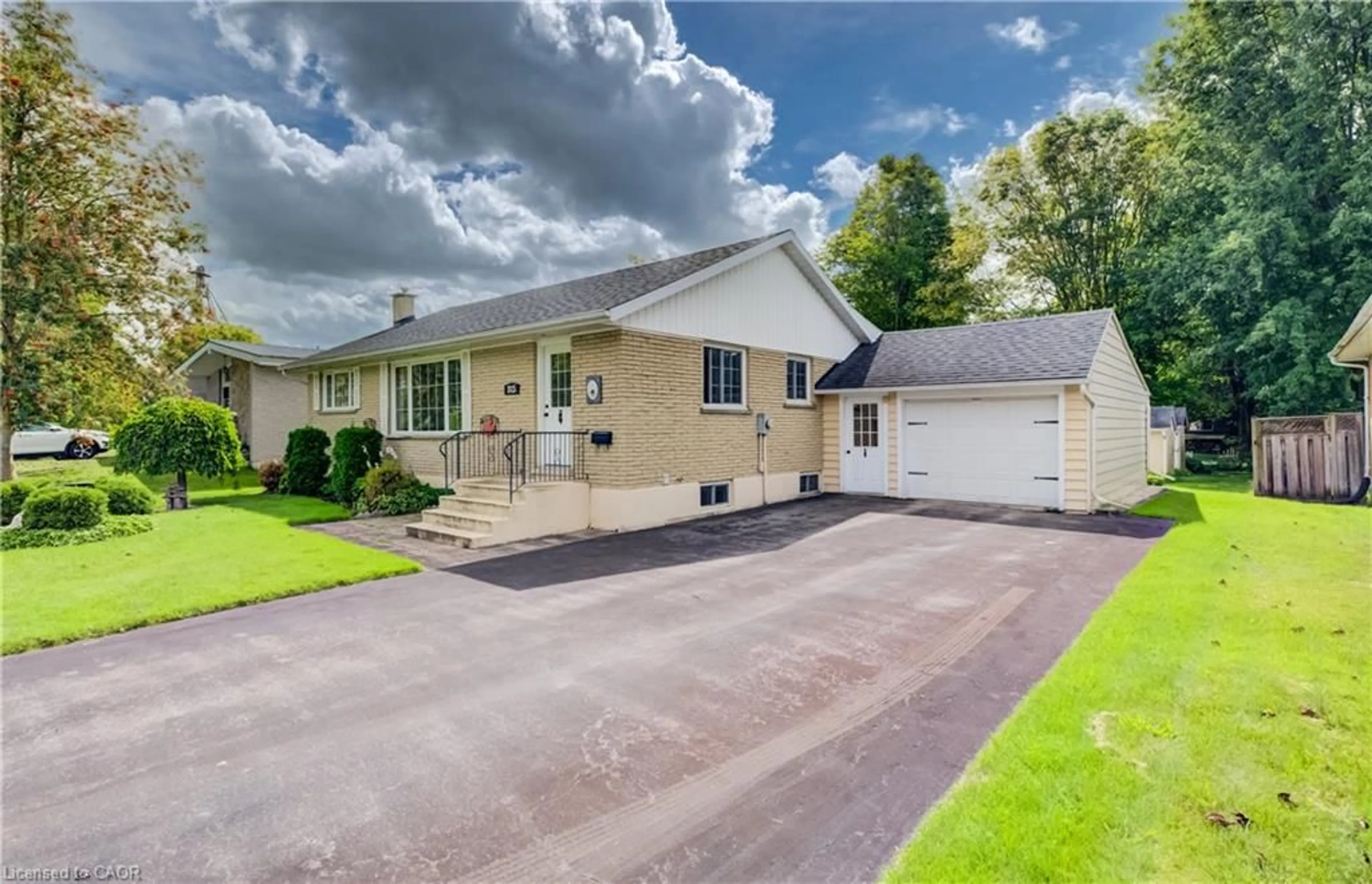 A pic from outside/outdoor area/front of a property/back of a property/a pic from drone, street for 315 Perth St, Mount Forest Ontario N0G 2L1