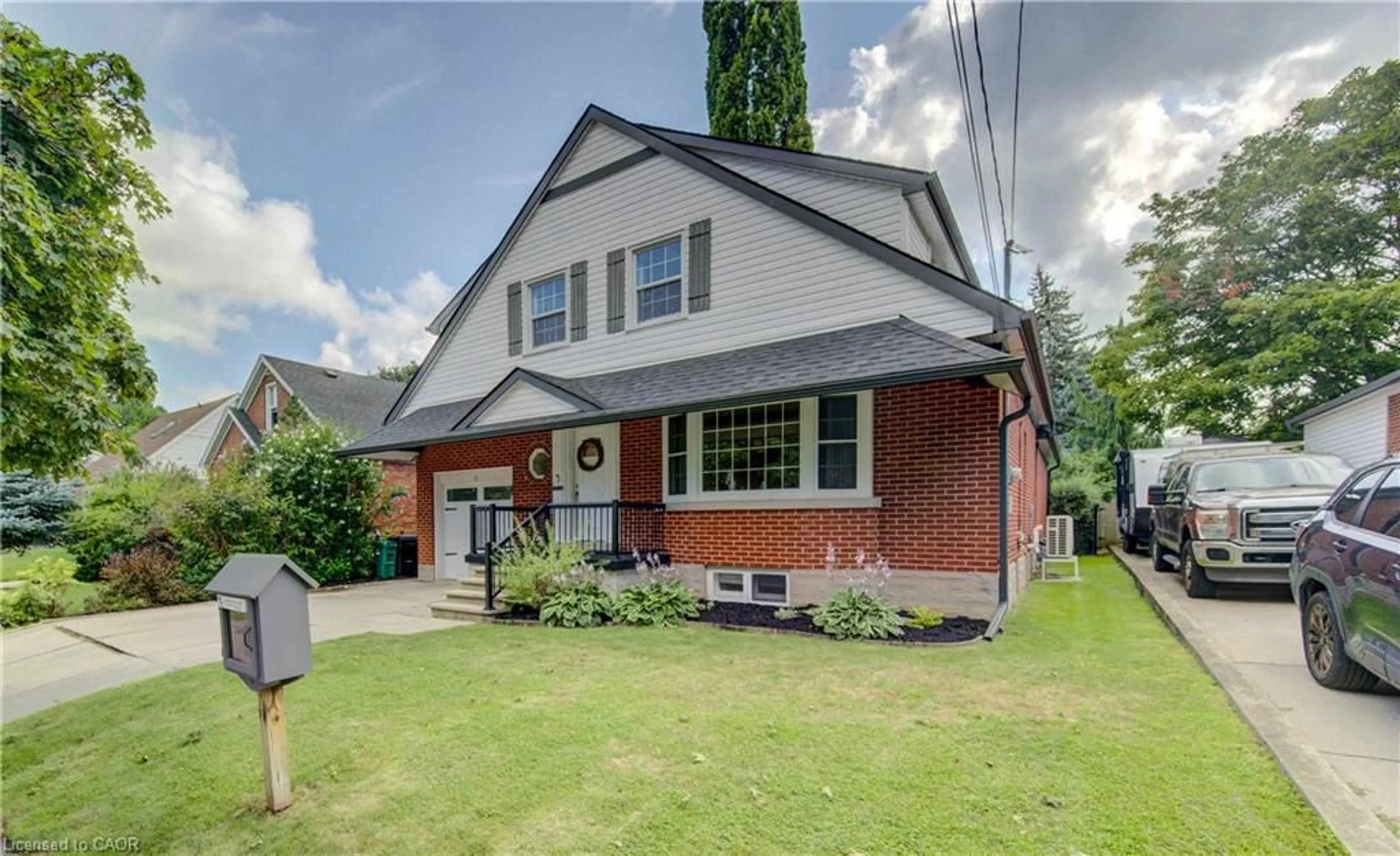Home with brick exterior material, street for 31 Edmund Rd, Kitchener Ontario N2H 1J5