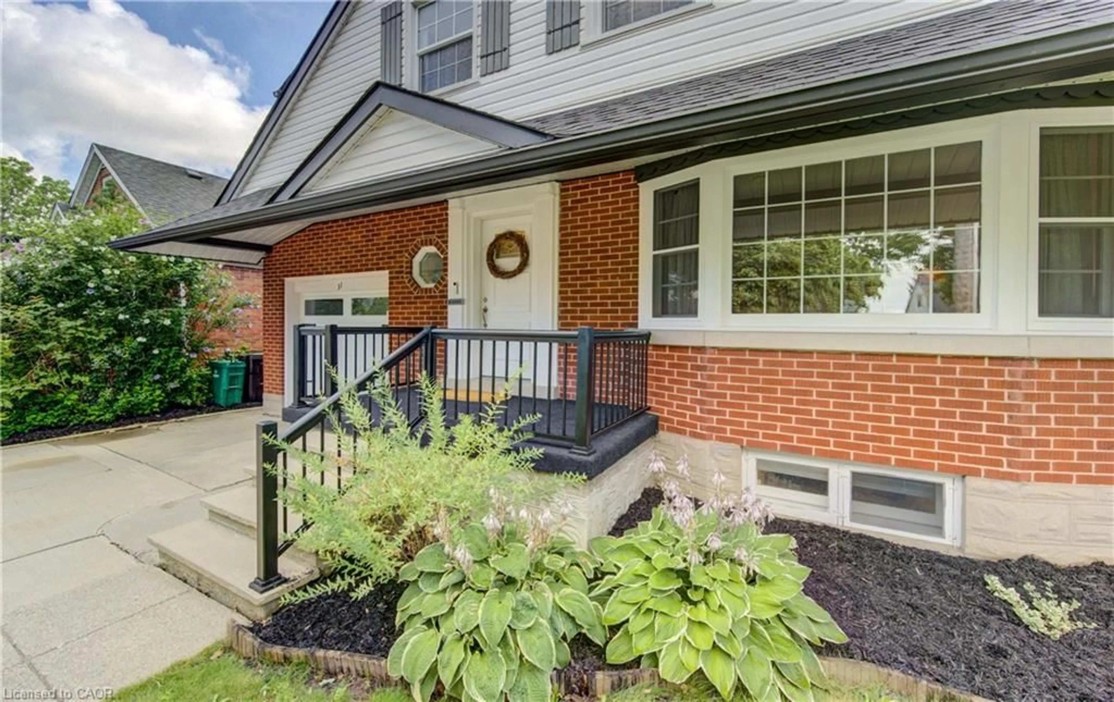 Home with brick exterior material, street for 31 Edmund Rd, Kitchener Ontario N2H 1J5