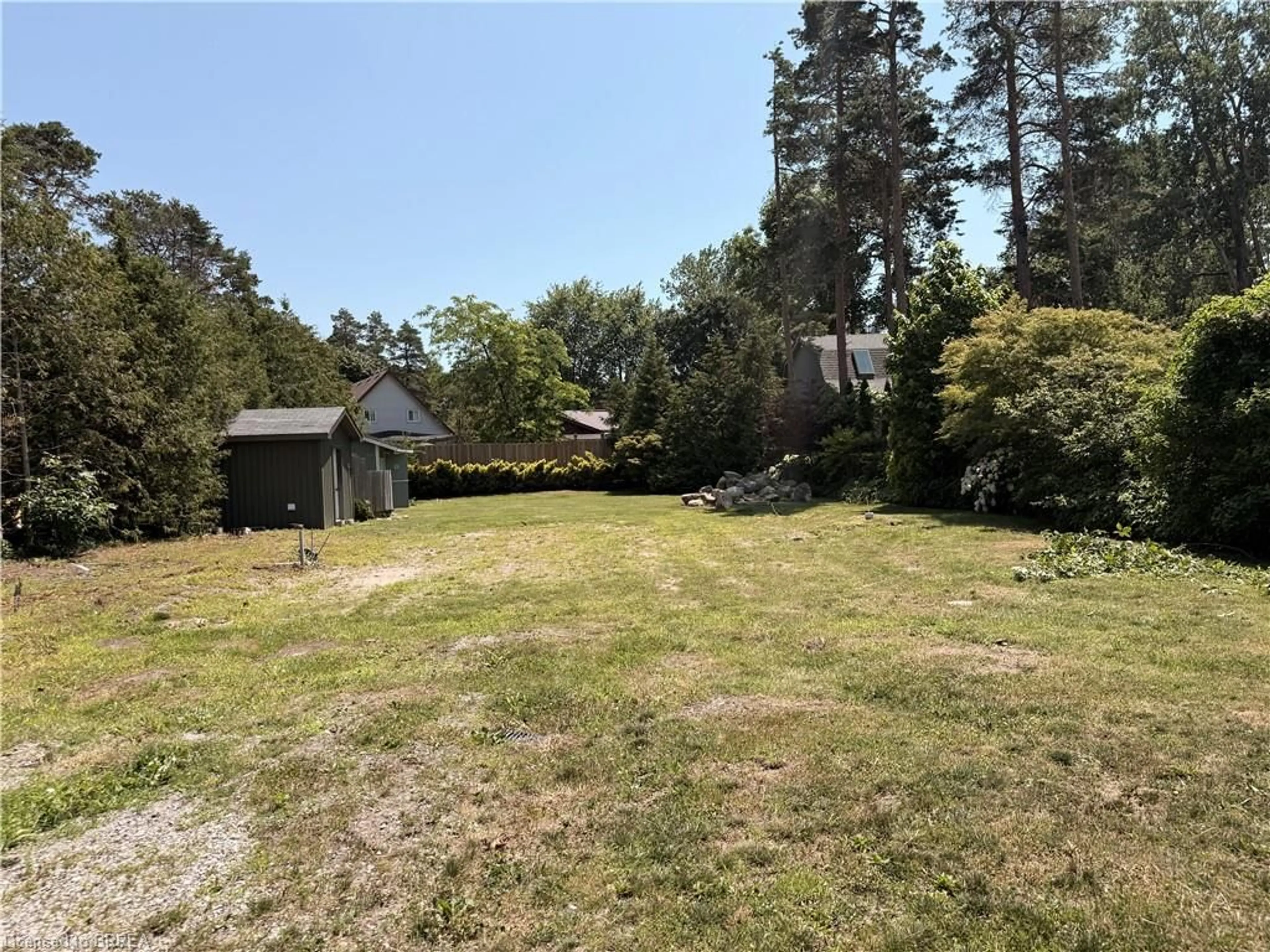 A pic from outside/outdoor area/front of a property/back of a property/a pic from drone, forest/trees view for 7 Old Cut Blvd, Port Rowan Ontario N0E 1M0