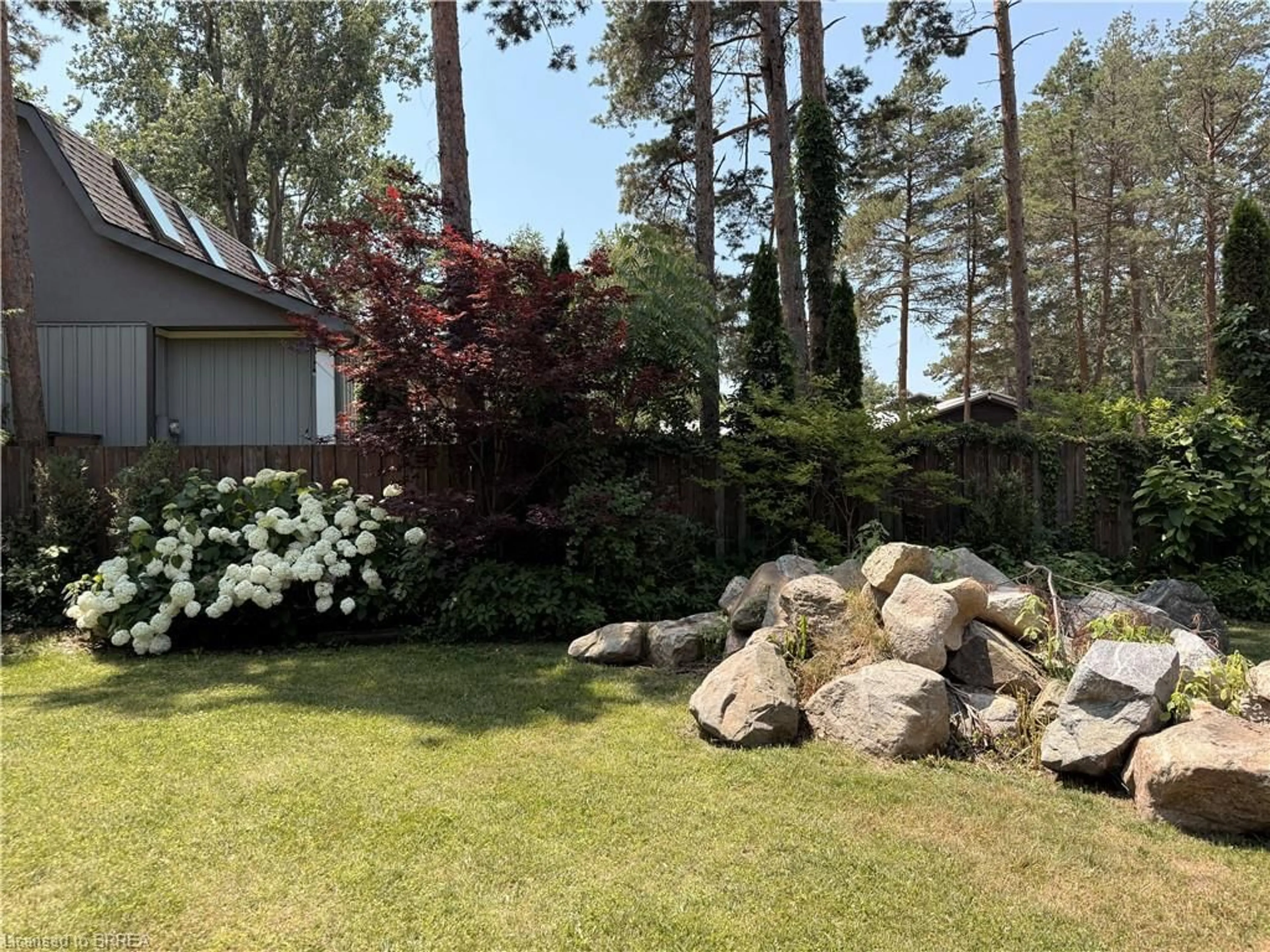 A pic from outside/outdoor area/front of a property/back of a property/a pic from drone, forest/trees view for 7 Old Cut Blvd, Port Rowan Ontario N0E 1M0