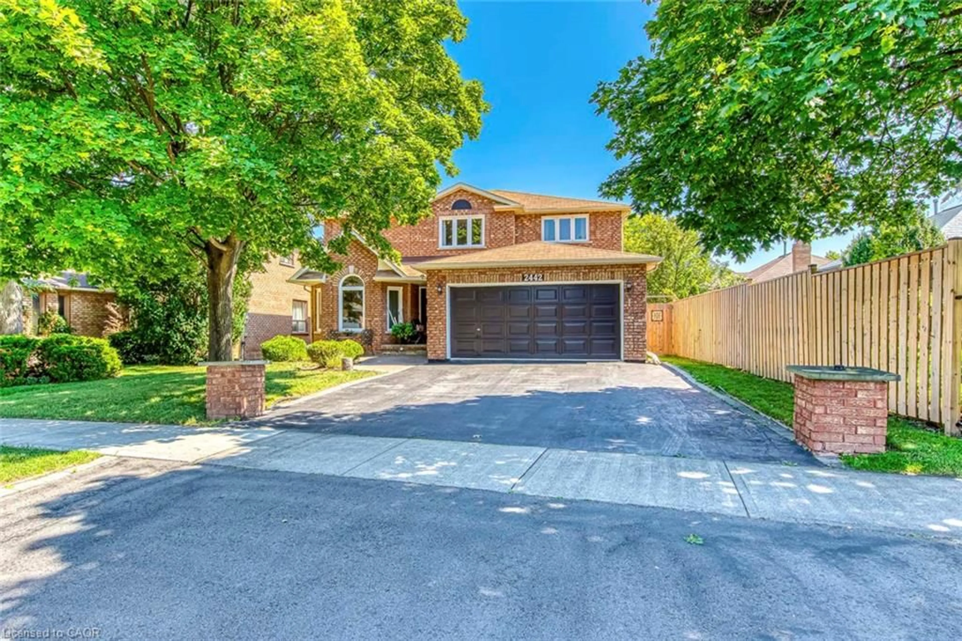 Home with brick exterior material, street for 2442 Wynten Way, Oakville Ontario L6J 7K9