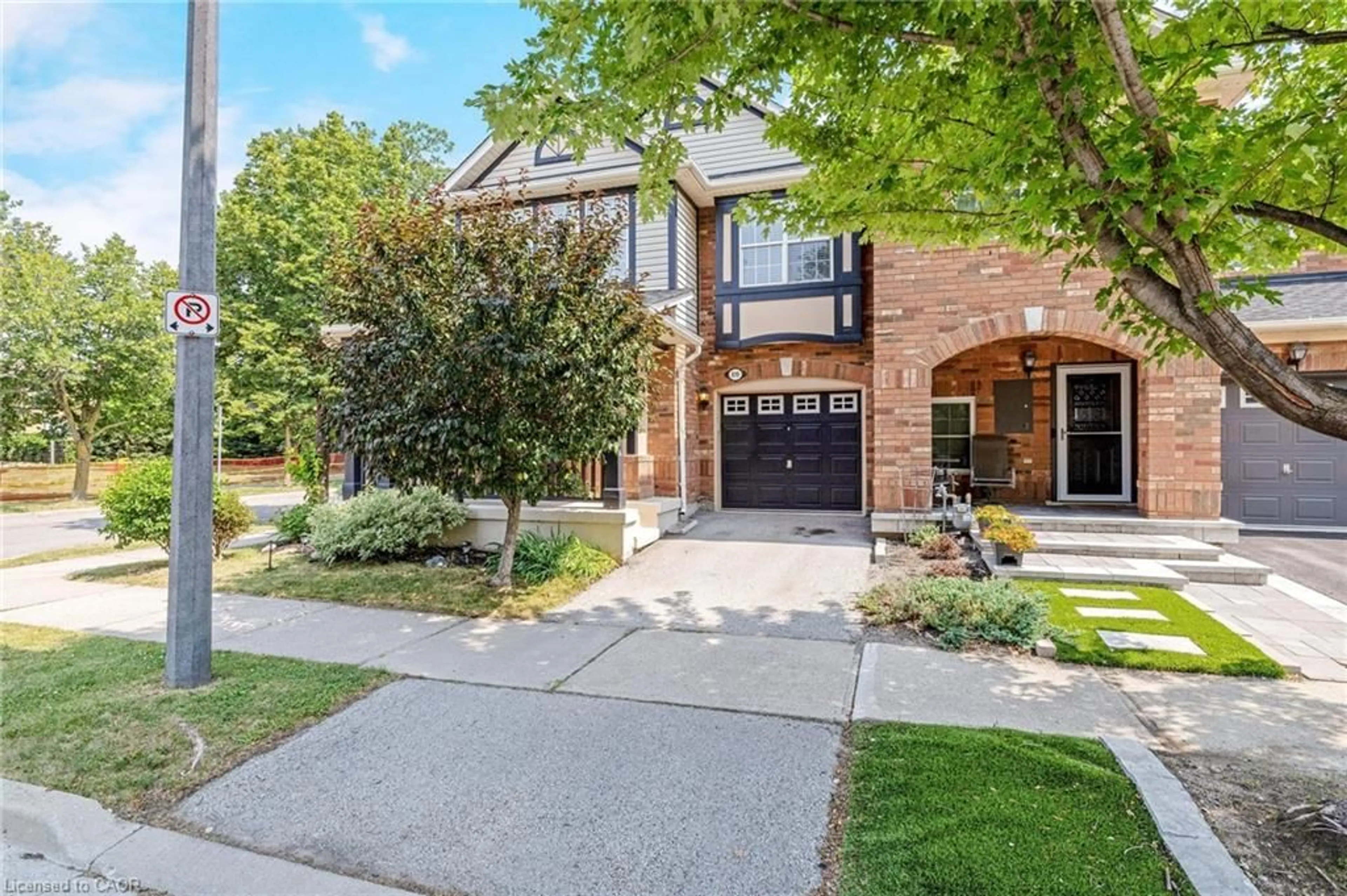 Home with brick exterior material, street for 619 Porter Way, Milton Ontario L9T 5V9