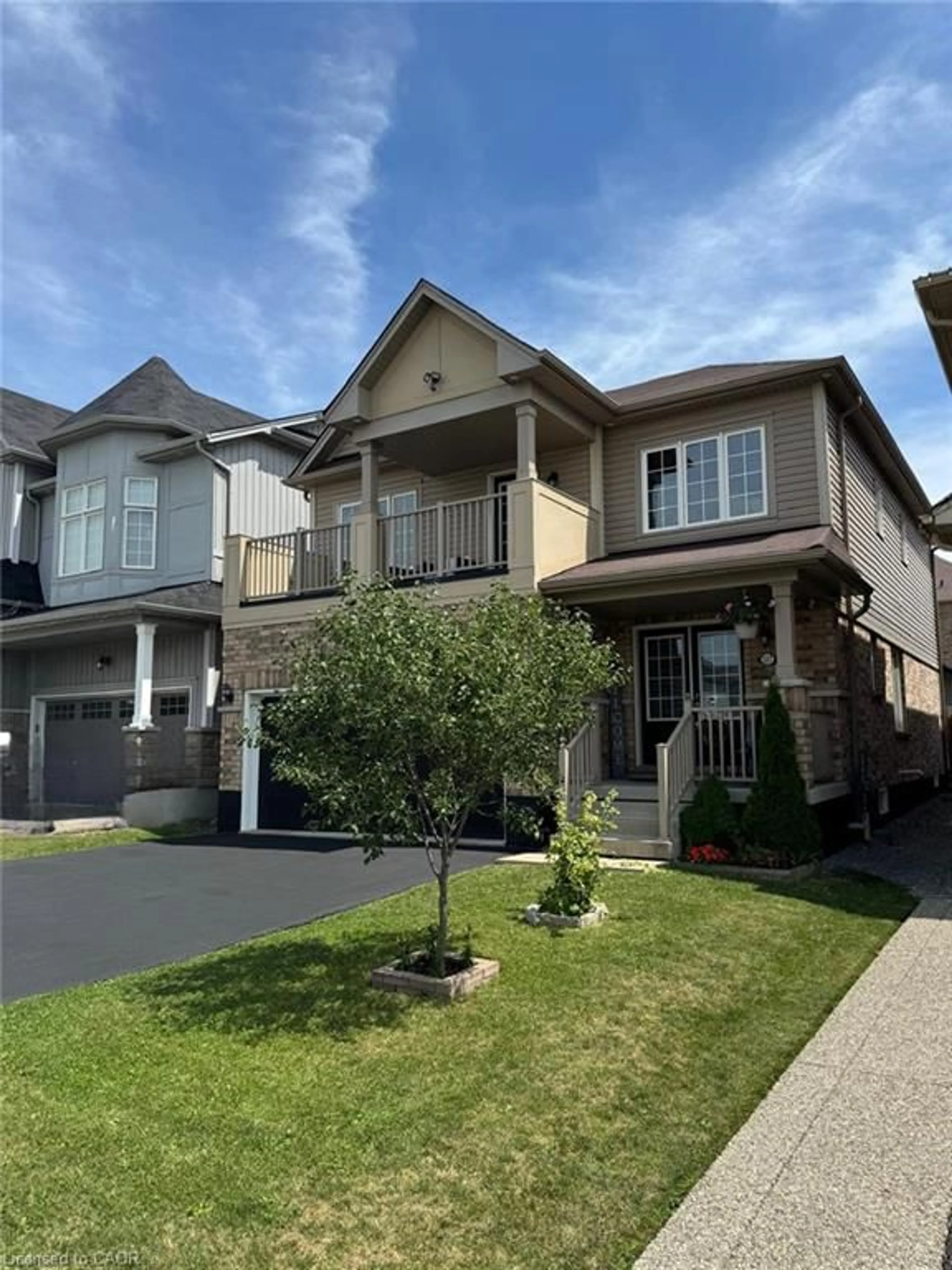 Home with vinyl exterior material, street for 127 Cook St, Binbrook Ontario L0R 1C0