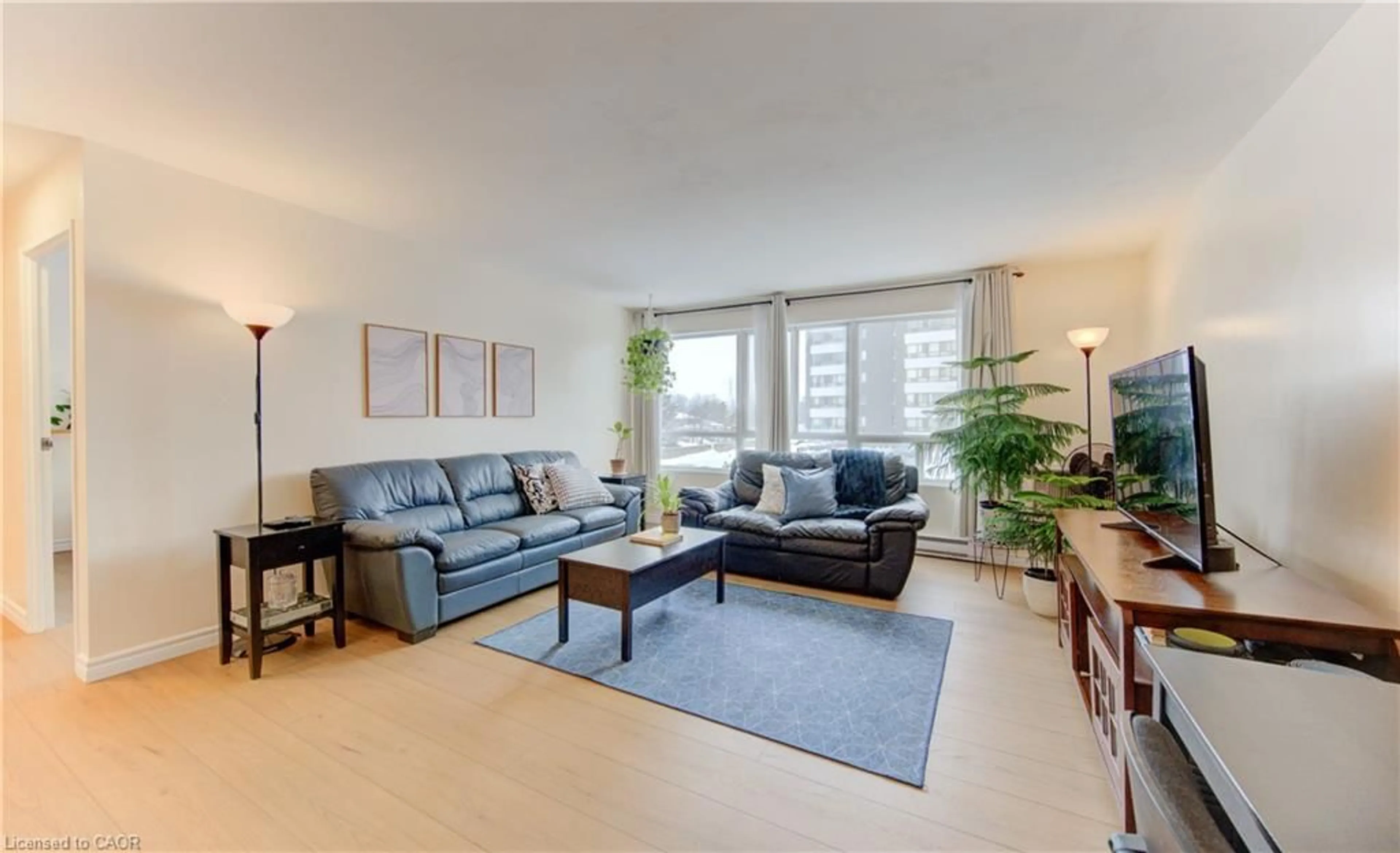 Living room with furniture, unknown for 65 Highland Cres #204, Kitchener Ontario N2M 5M8