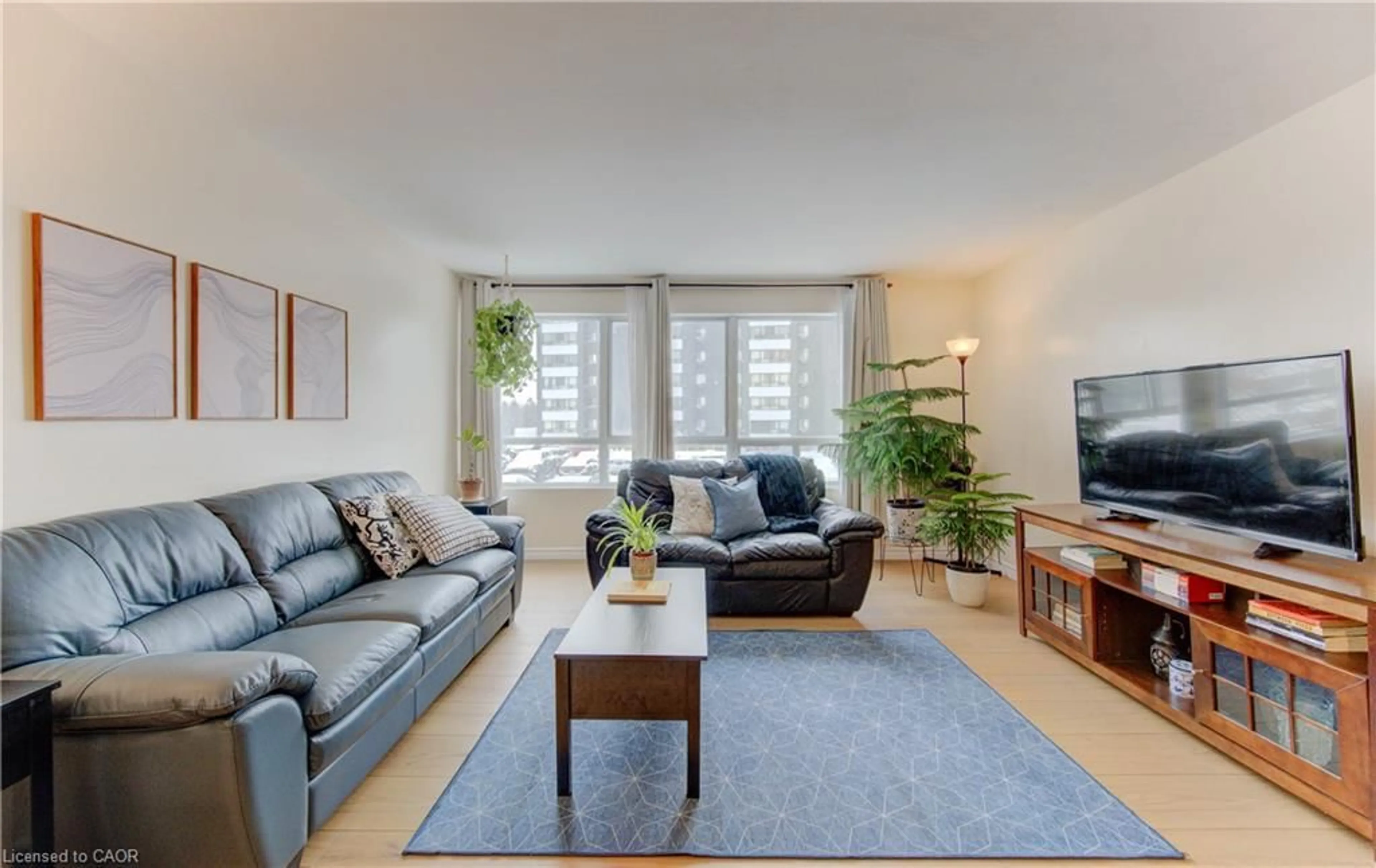 Living room with furniture, unknown for 65 Highland Cres #204, Kitchener Ontario N2M 5M8