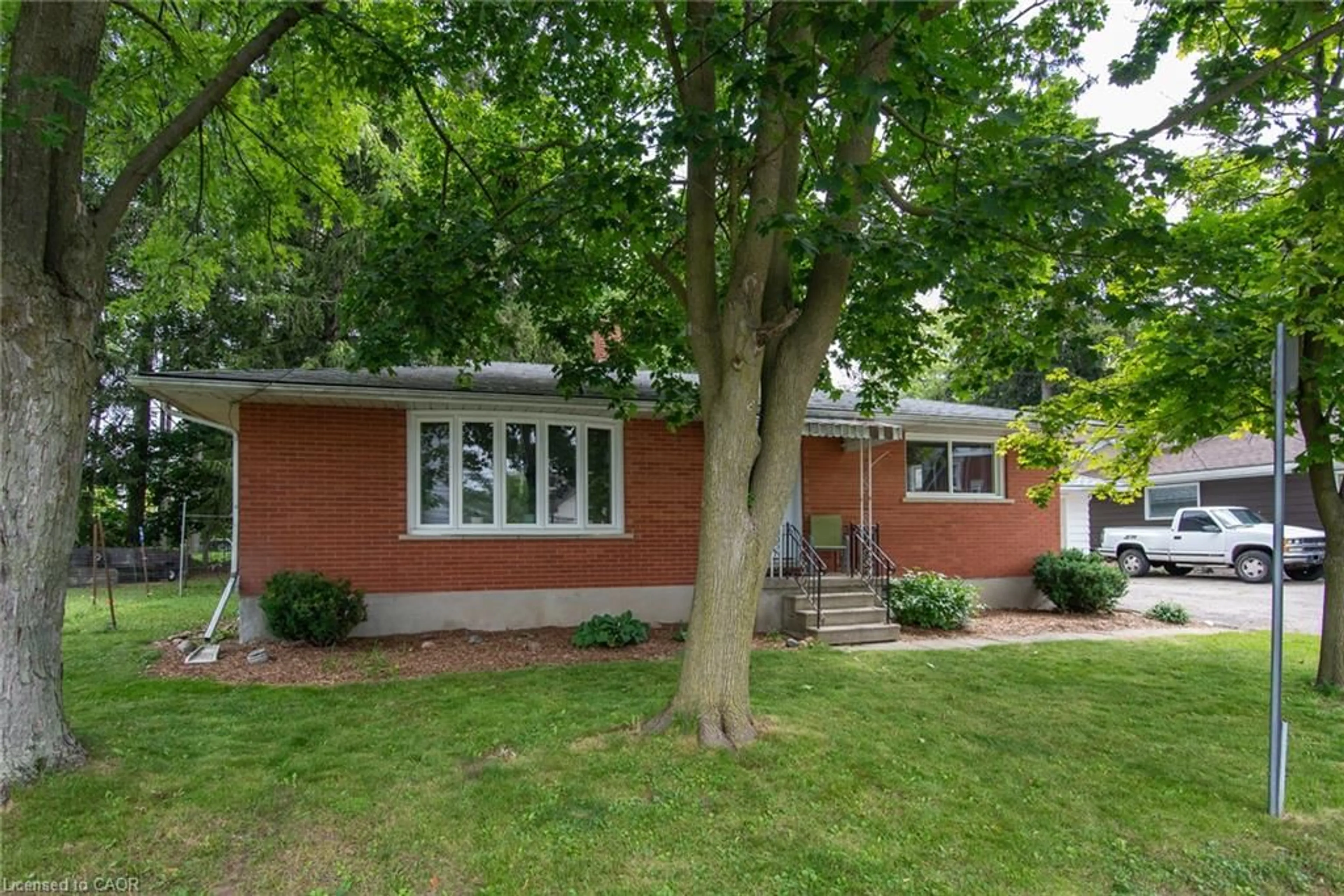 Home with brick exterior material, street for 13 Lewis St, New Hamburg Ontario N3A 1P5