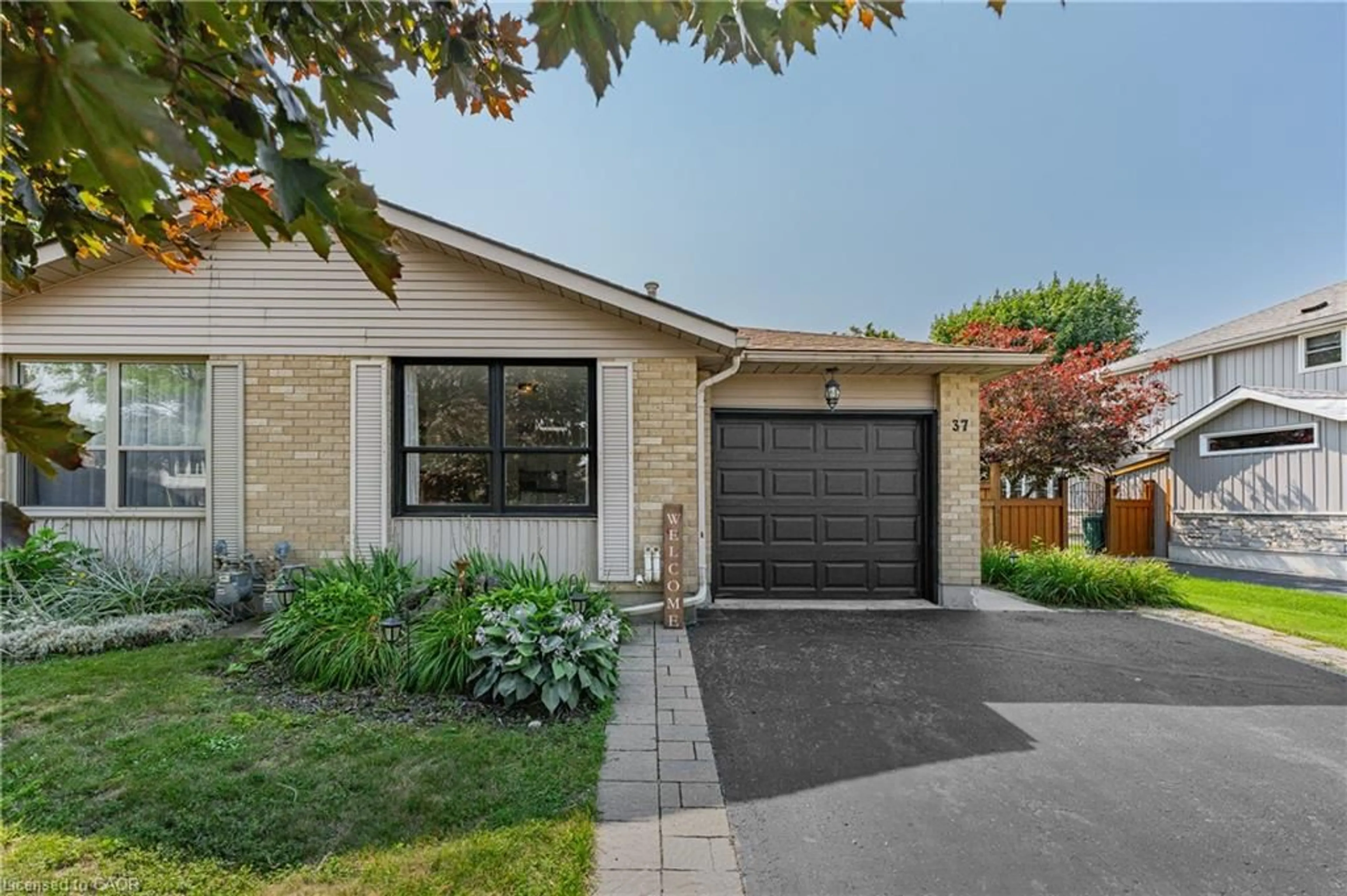 Home with brick exterior material, street for 37 Sandalwood Dr, Cambridge Ontario N1P 1A9