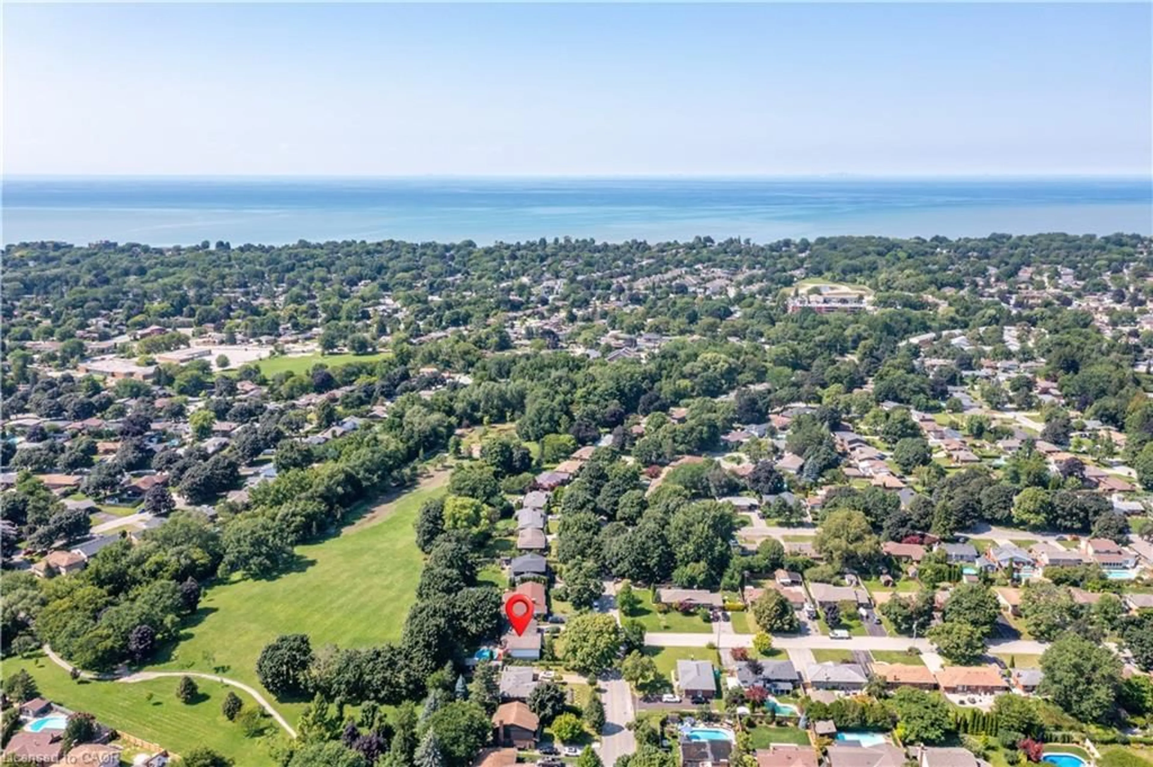 A pic from outside/outdoor area/front of a property/back of a property/a pic from drone, water/lake/river/ocean view for 55 Richelieu Dr, St. Catharines Ontario L2M 2C3