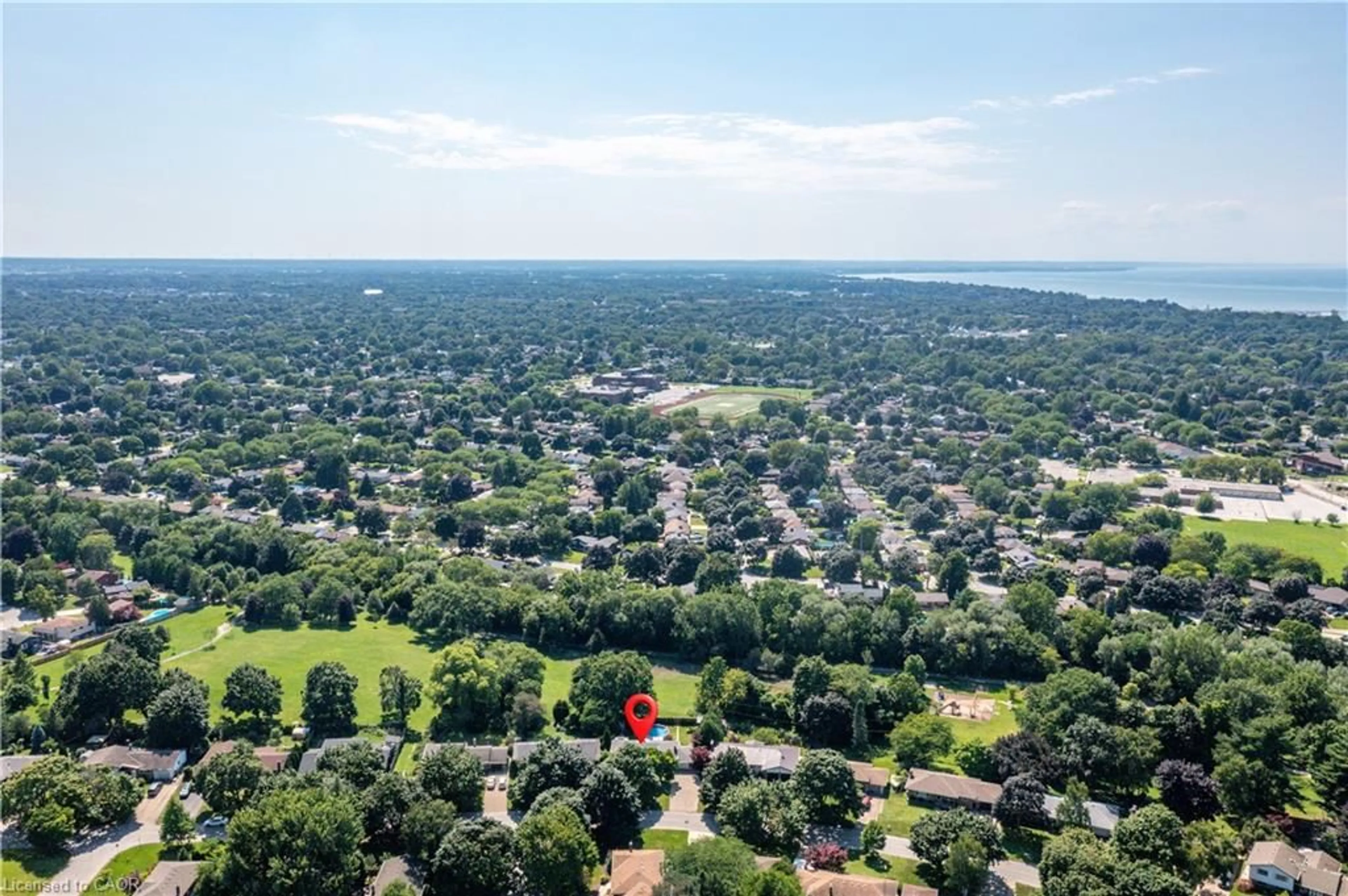 A pic from outside/outdoor area/front of a property/back of a property/a pic from drone, water/lake/river/ocean view for 55 Richelieu Dr, St. Catharines Ontario L2M 2C3