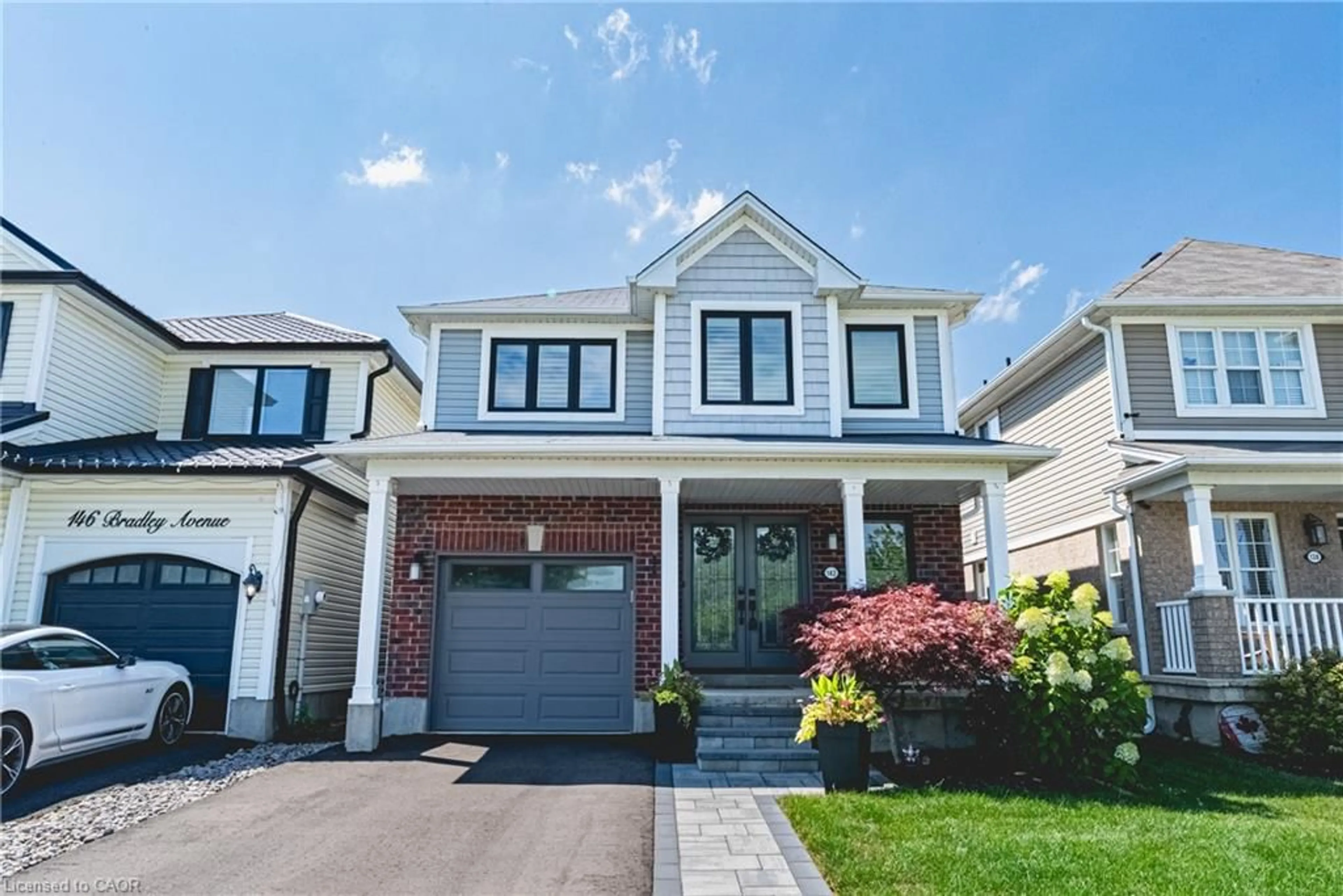 Home with brick exterior material, street for 142 Bradley Ave, Binbrook Ontario L0R 1C0