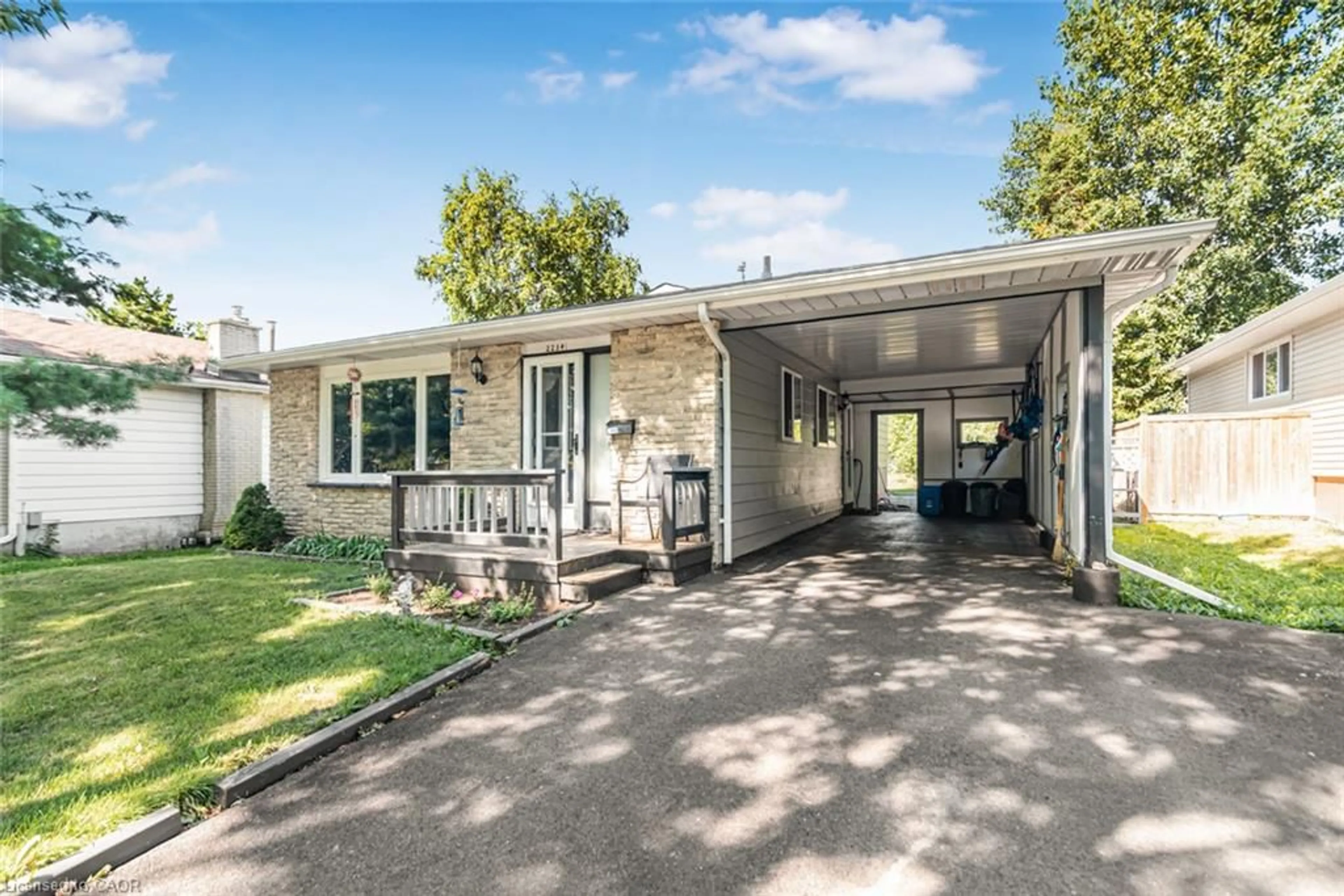 Home with vinyl exterior material, street for 2234 Sheffield Dr, Burlington Ontario L7P 2X1