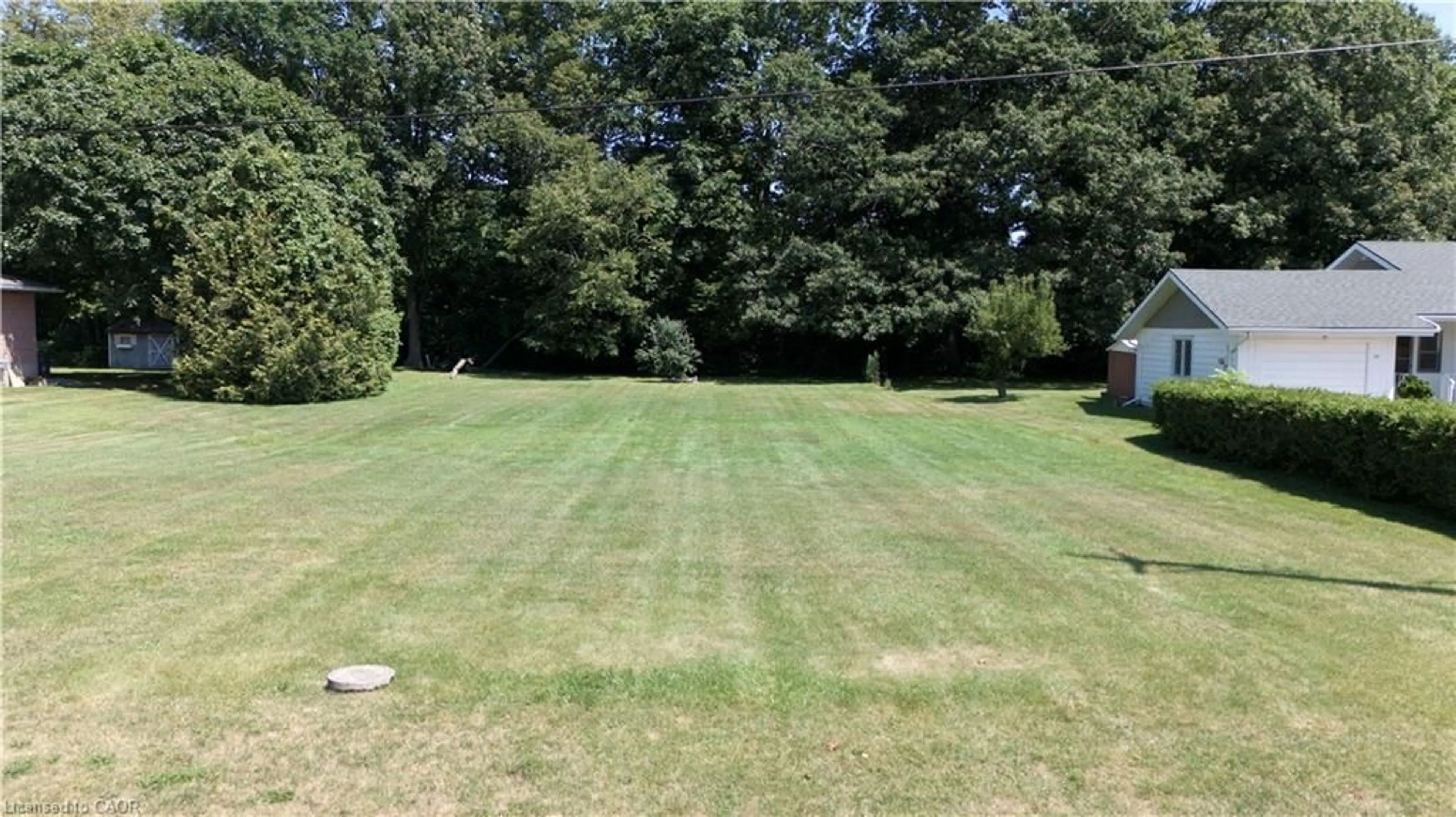 A pic from outside/outdoor area/front of a property/back of a property/a pic from drone, unknown for 8 Sunninghill Dr, Port Dover Ontario N0A 1N6