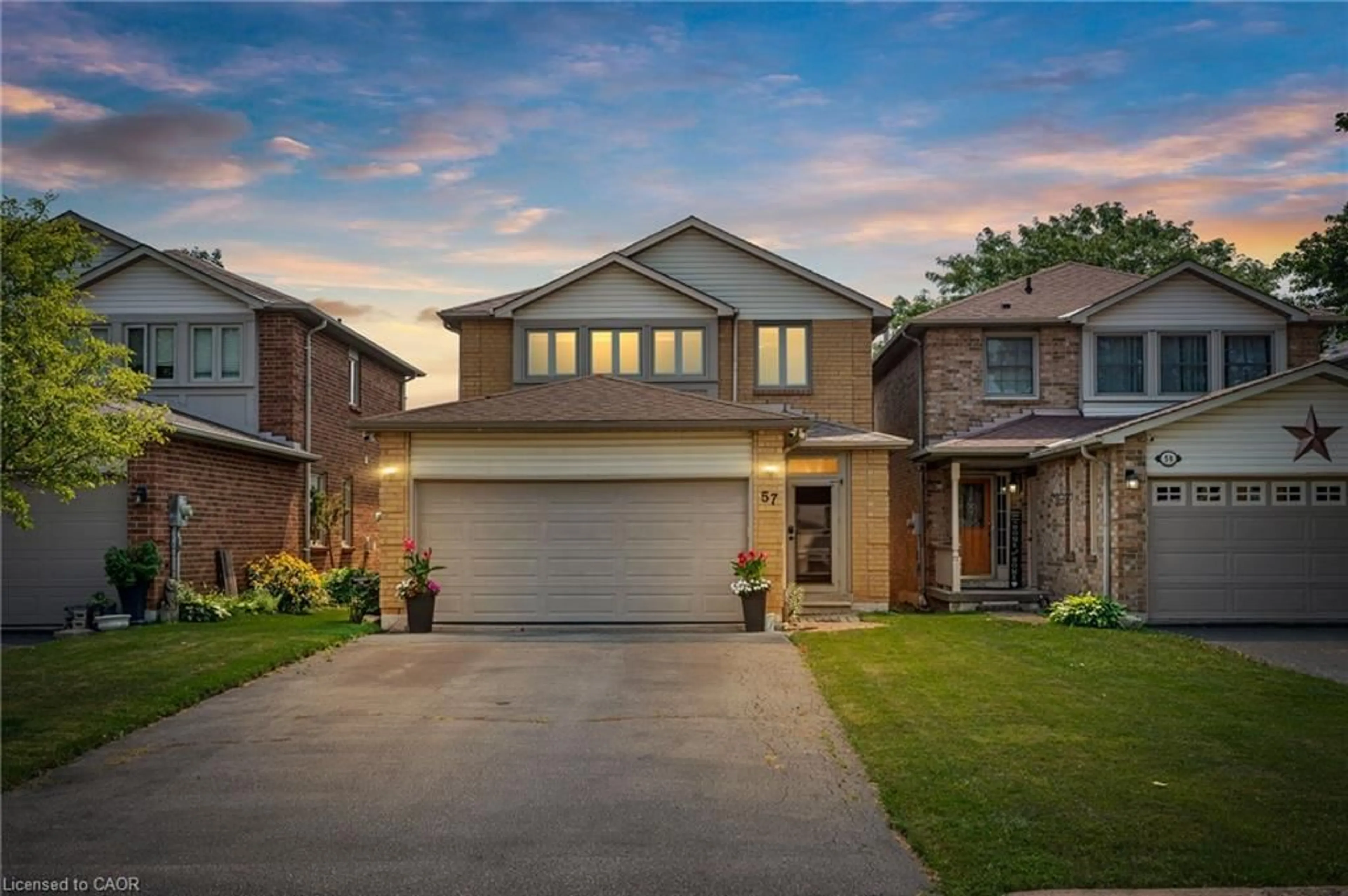 Home with brick exterior material, street for 57 Grindstone Way, Waterdown Ontario L9H 7B5