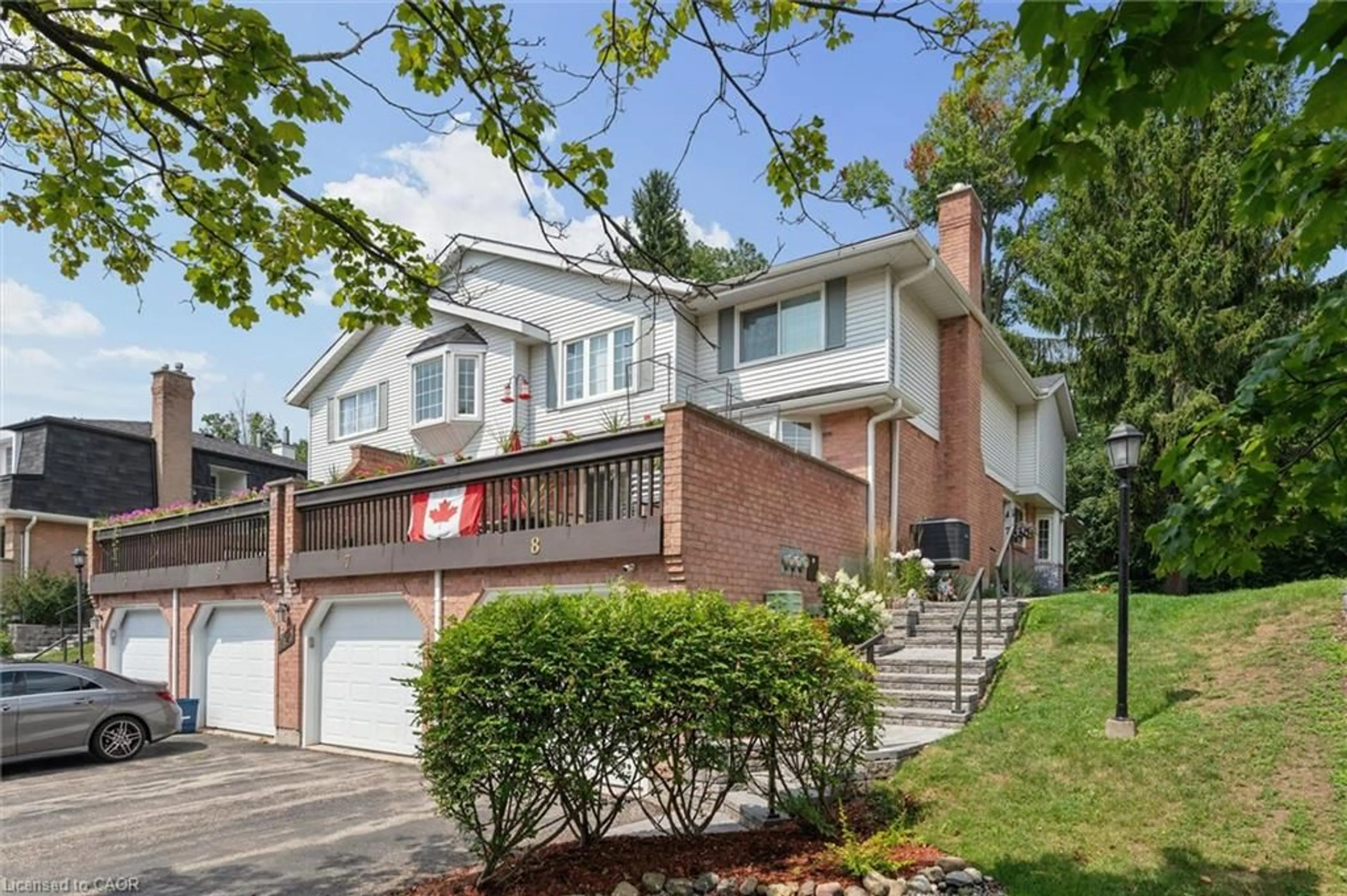 Home with brick exterior material, street for 220 Kingswood Dr #7, Kitchener Ontario N2E 2K2